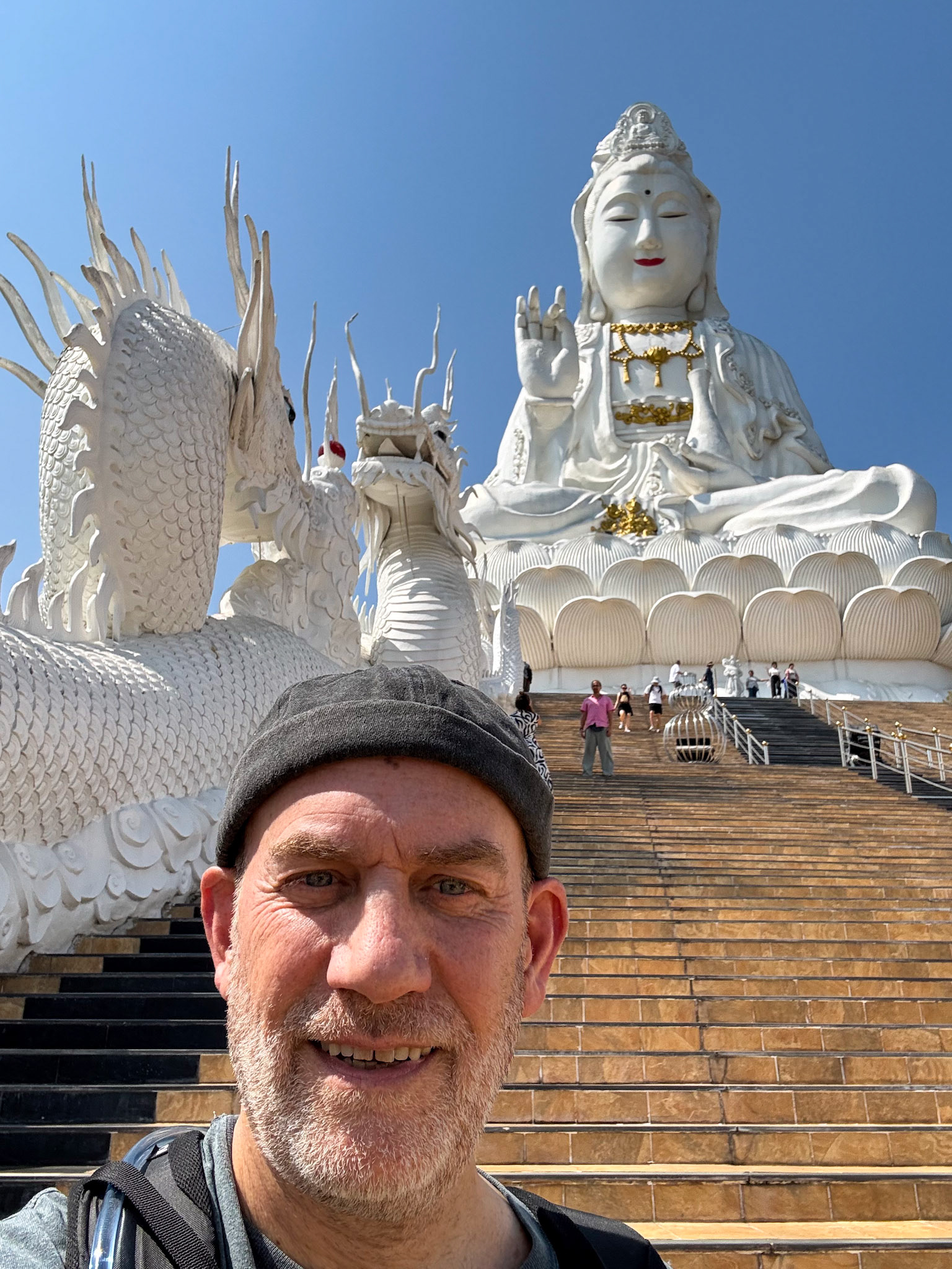Random man with Guan Yin, Wat Huay Pla Kang temple complex