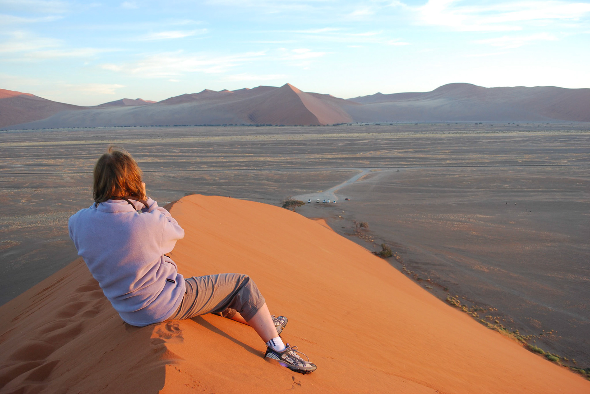 CG on Dune 45 at sunrise. 170m tall in Namib Desert, Namibia