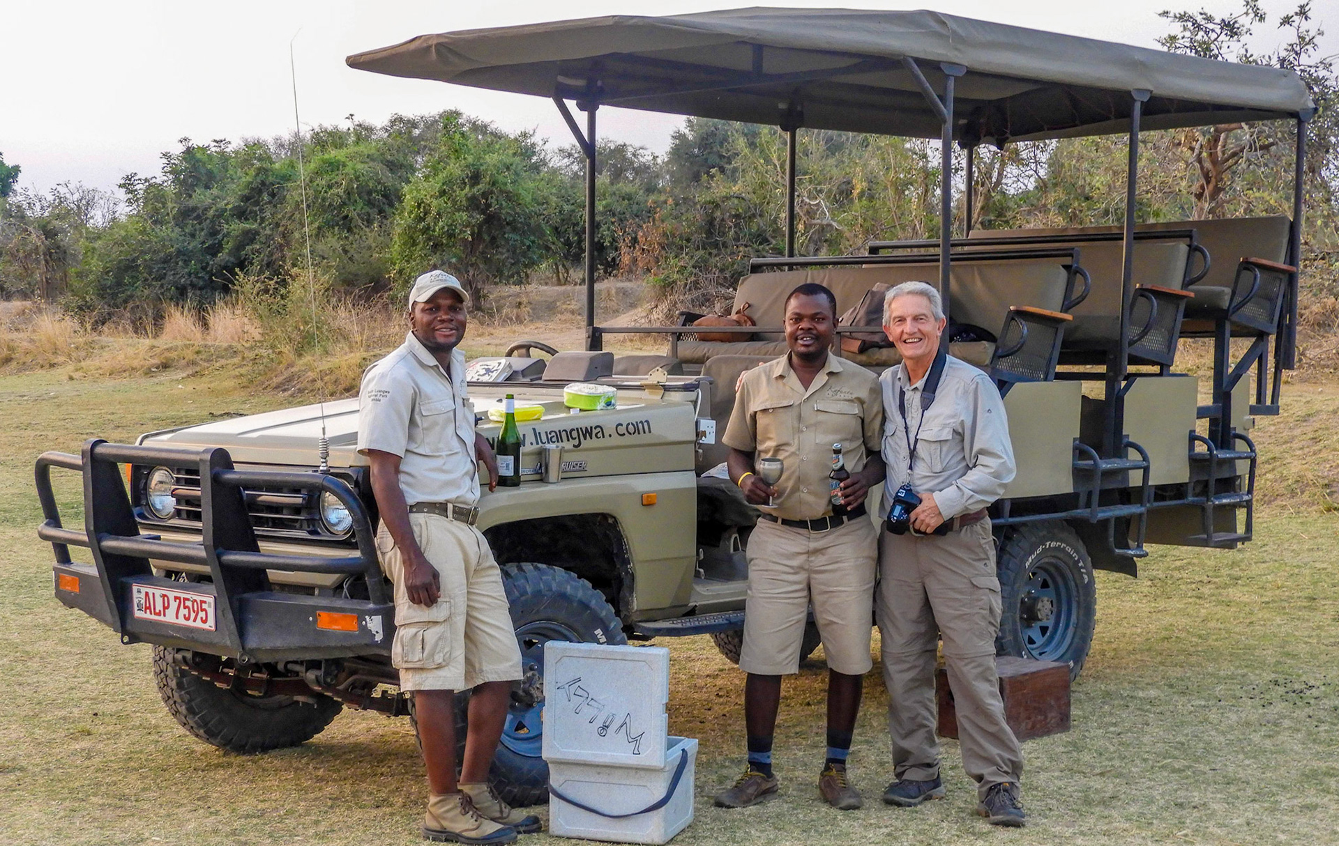 DG with the guides at sundown, South Luangwa. DG " I don't think Catherine has seen that Lioness behind her yet !!"