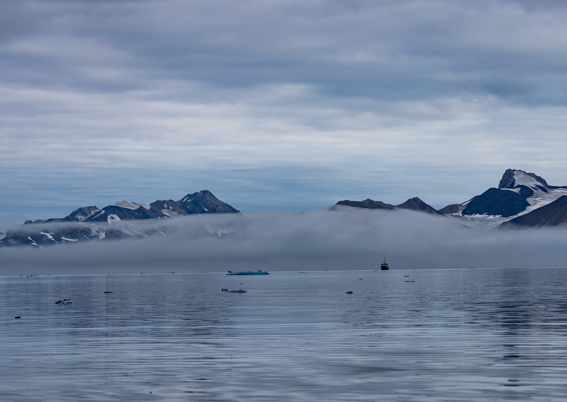 M/S Sjoveien in fog, Burgerbuktafjorden, Svalbard. 07-08-2022.