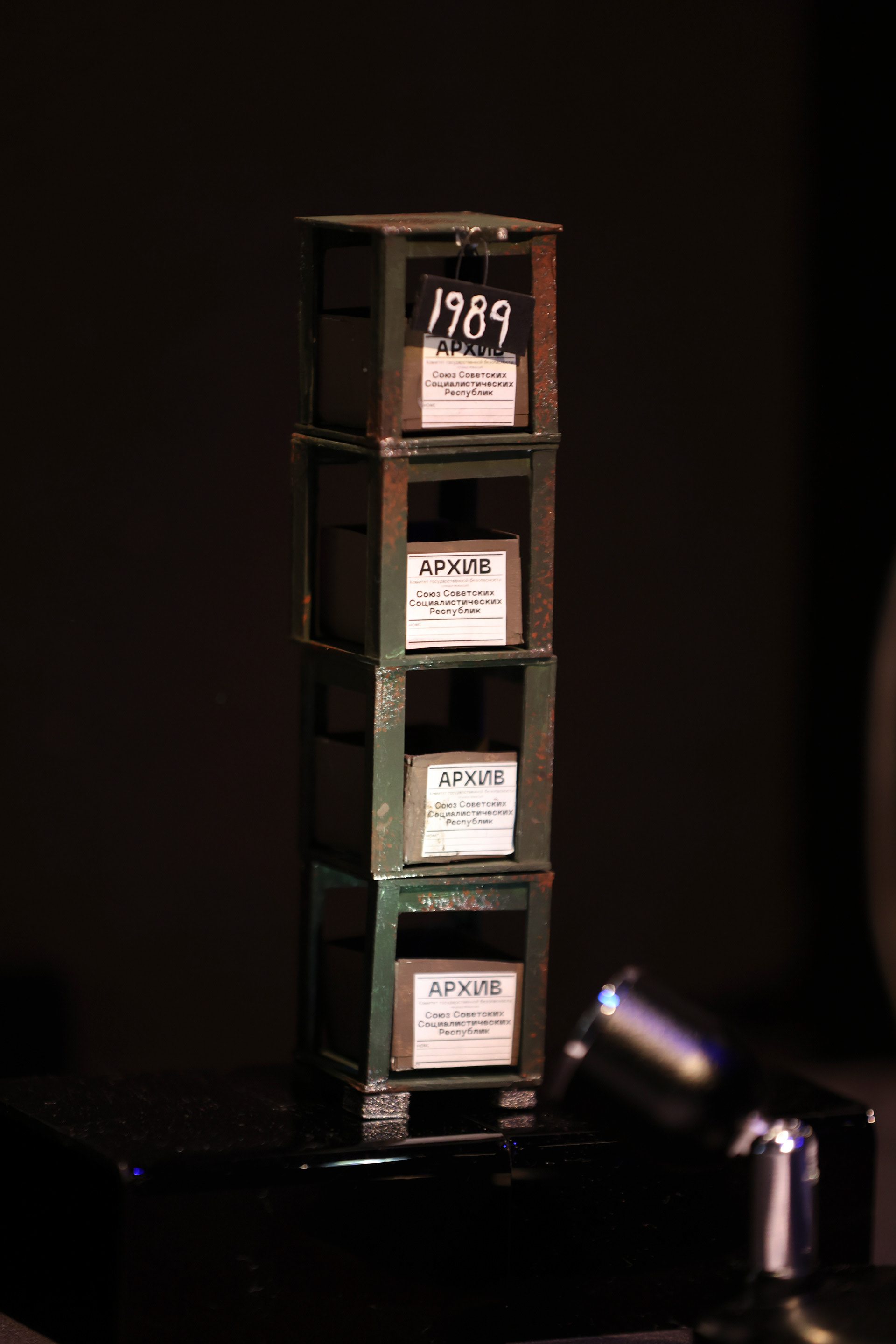 1" scale model of archive shelf from Describe the Night