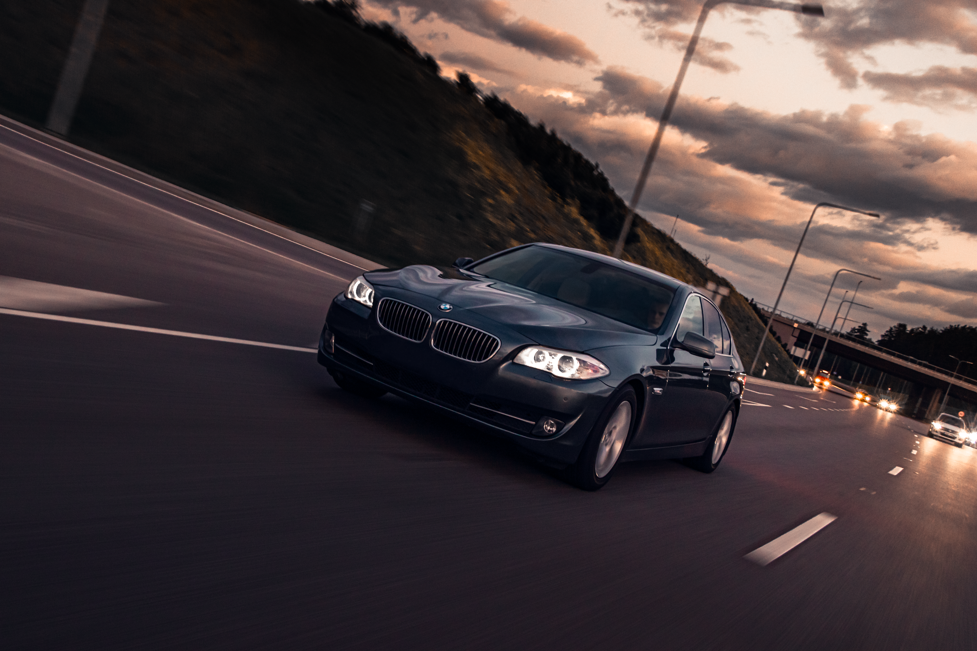 A BMW F10 528i driving in the city