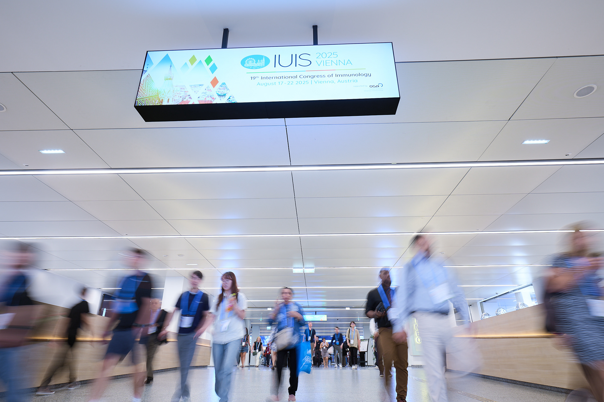 Dynamic long exposure shot of the IUIS 2025 congress entrance