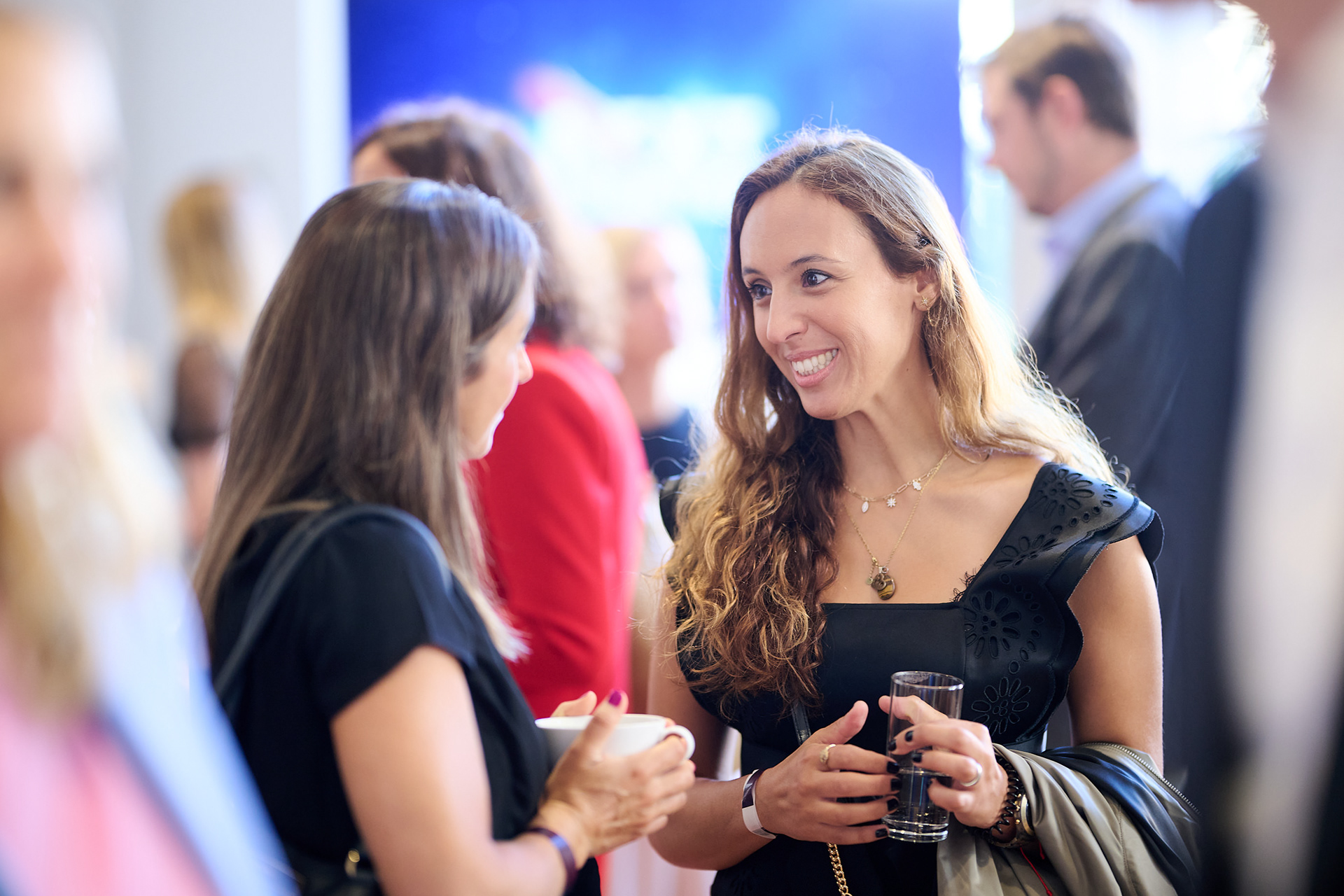 Creative event photography highlighting conference branding and atmosphere