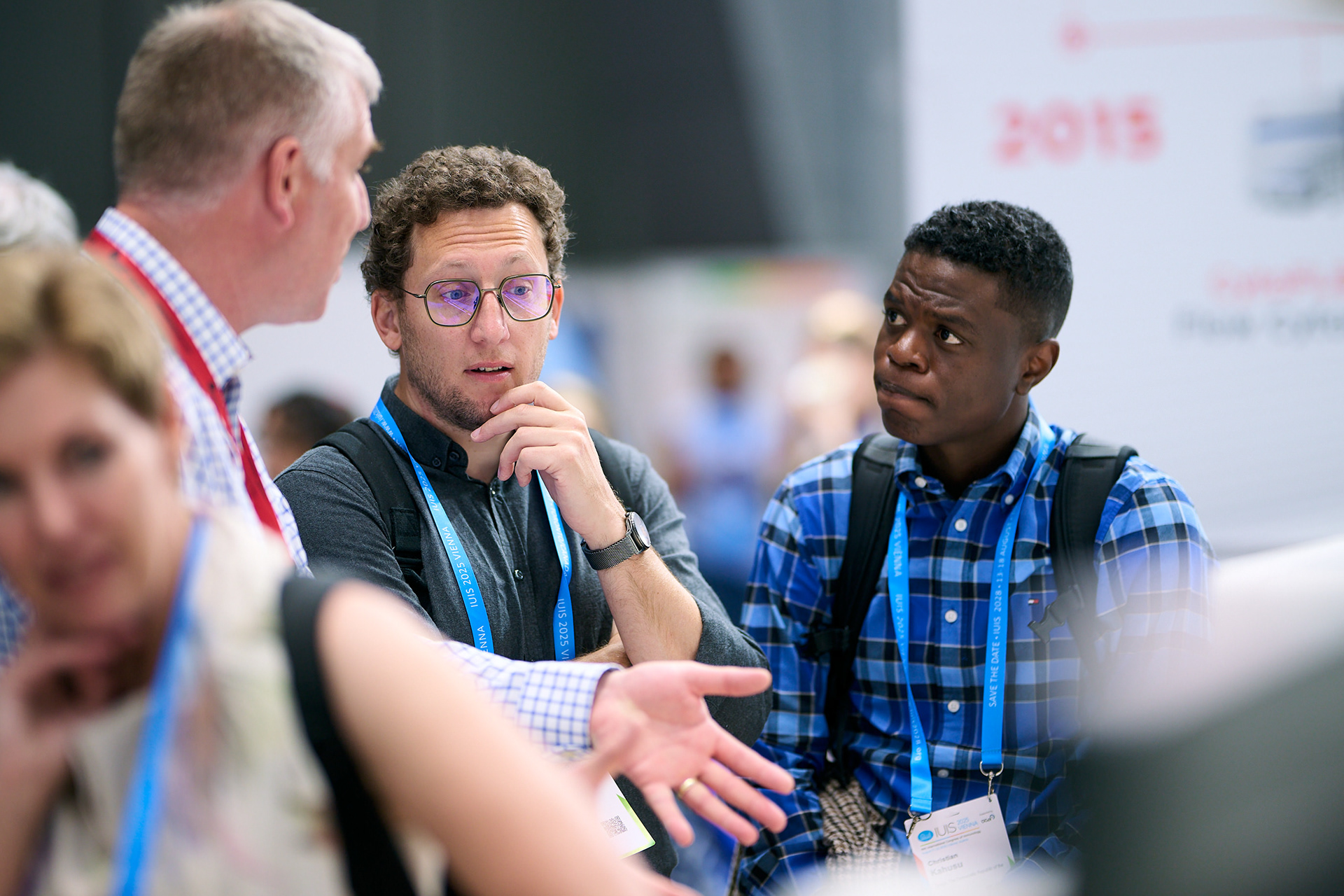 Congress attendees exploring innovations at an exhibition booth