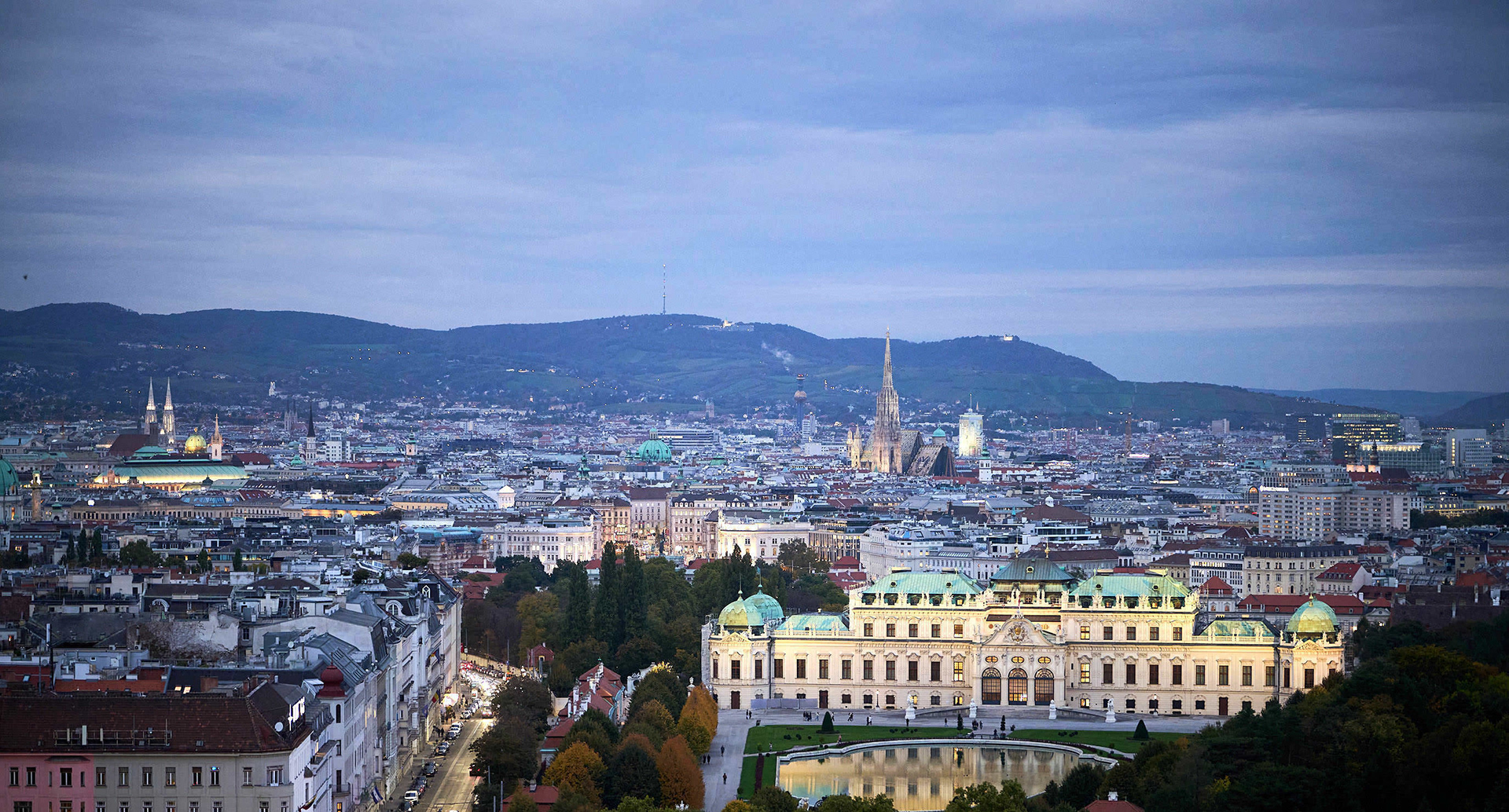 An evening view of Belvedere Palace and Vienna's cityscape
