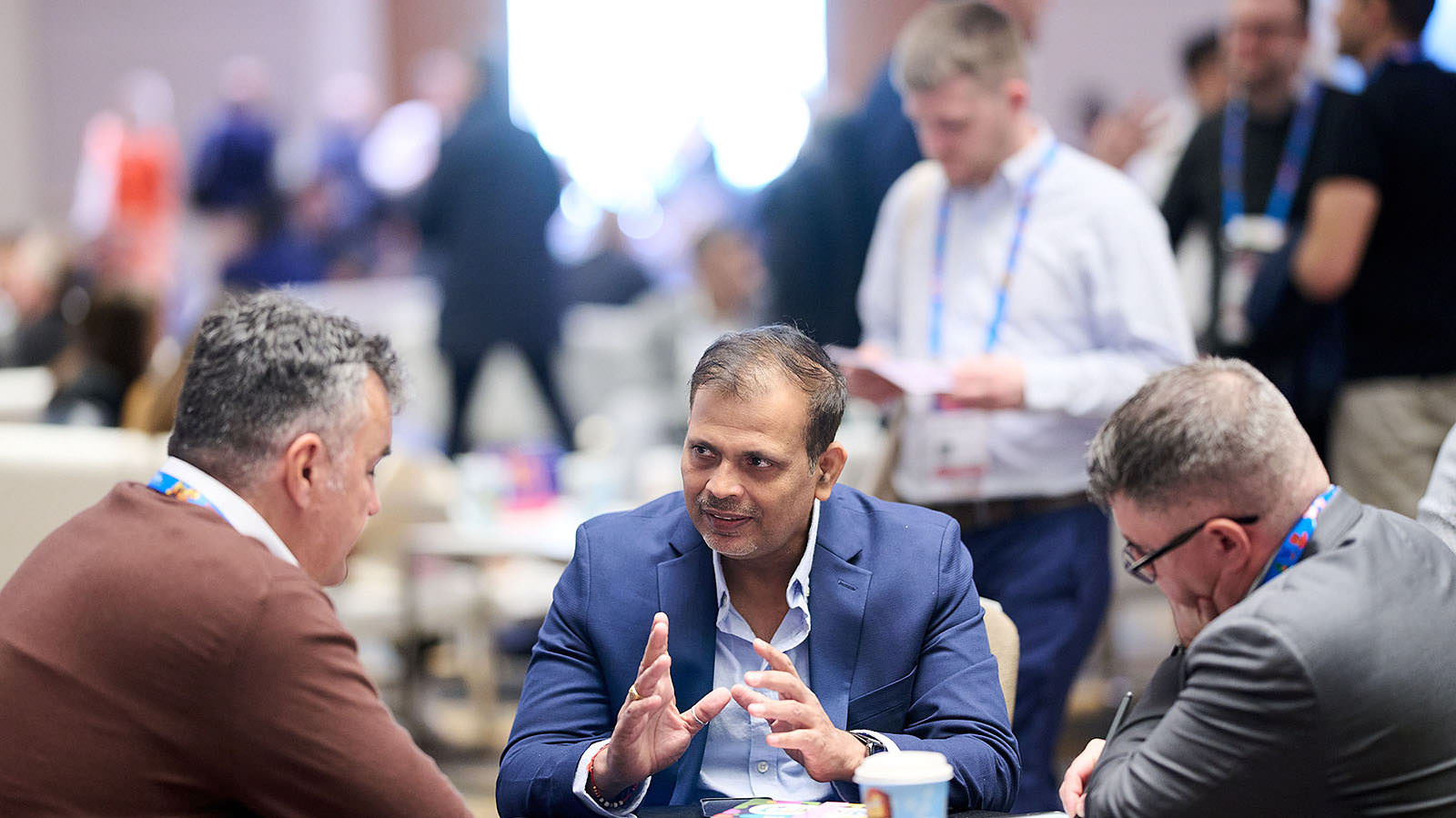 Intense and focused business discussion taking place.