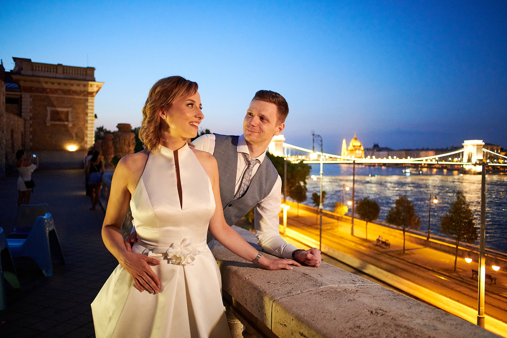  Beautiful couple with the Chain Bridge and city scape as a backdrop. 
