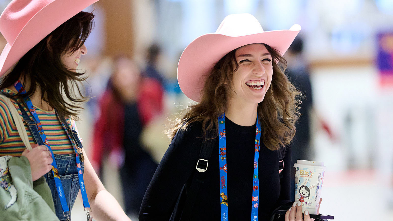 Joyful cowgirls radiating happiness.