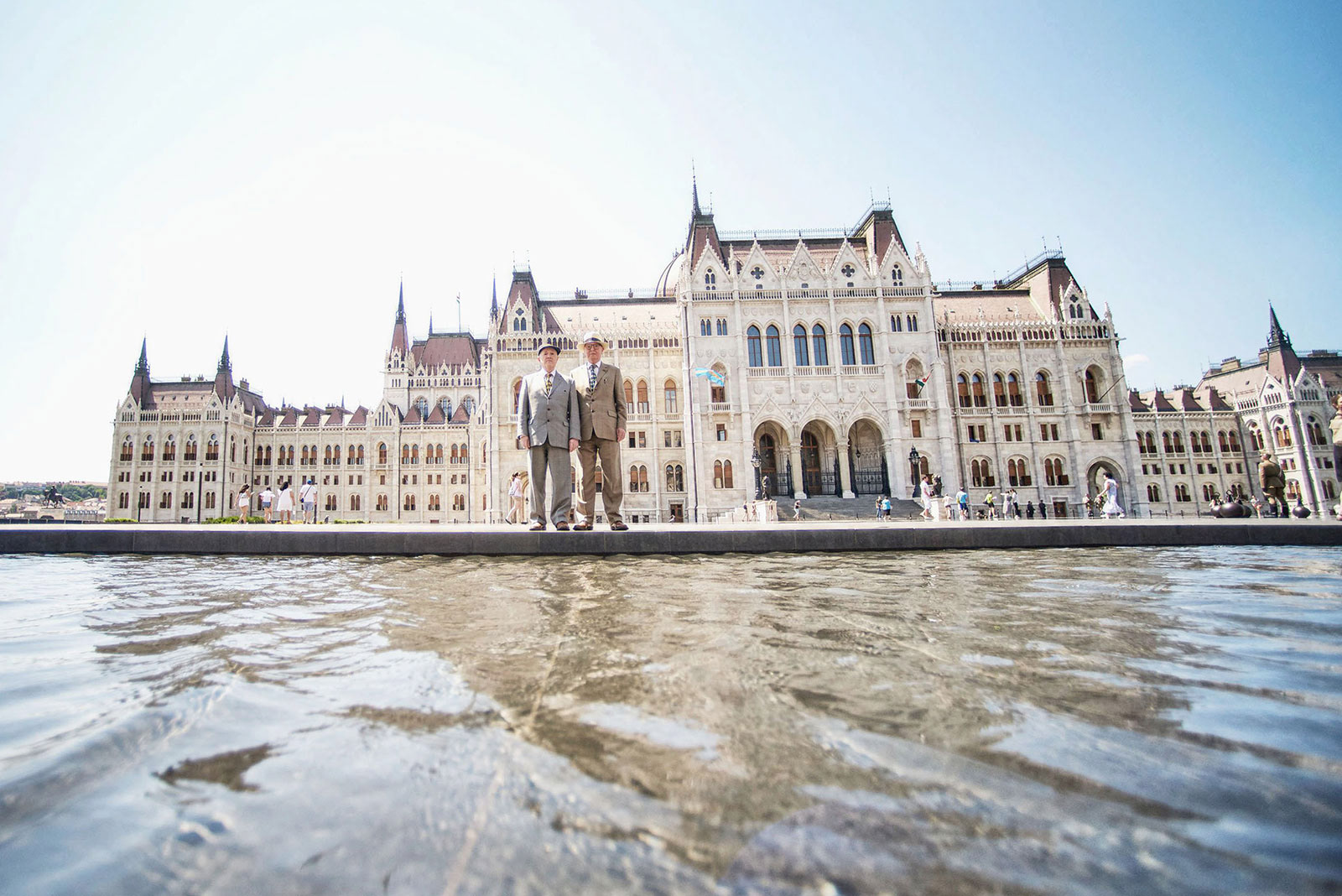 Gilbert & George in front of the Hungarian Parliament building