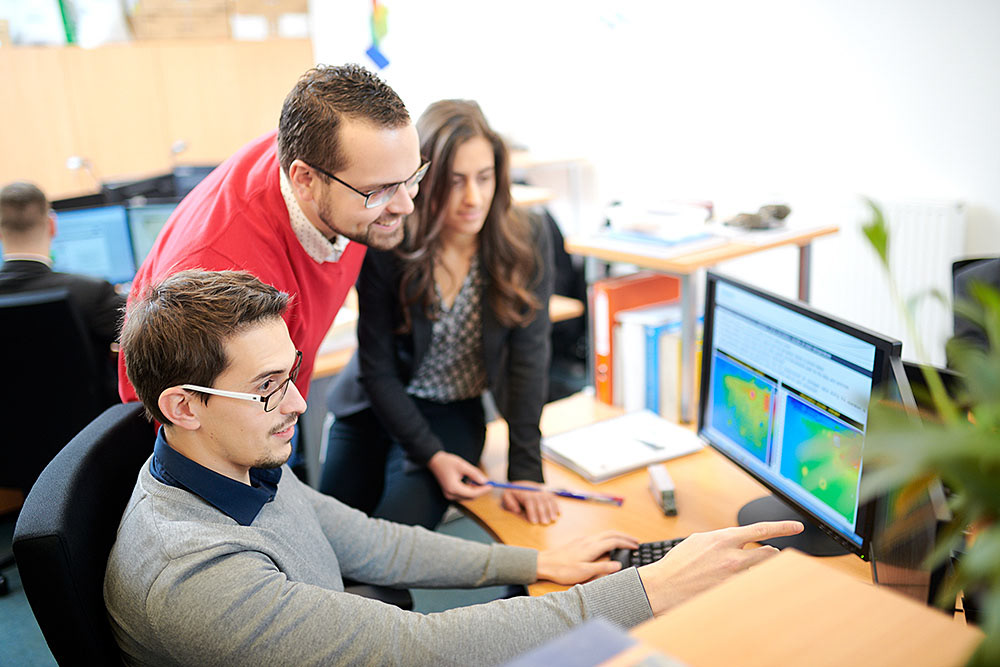Company employees working in the office