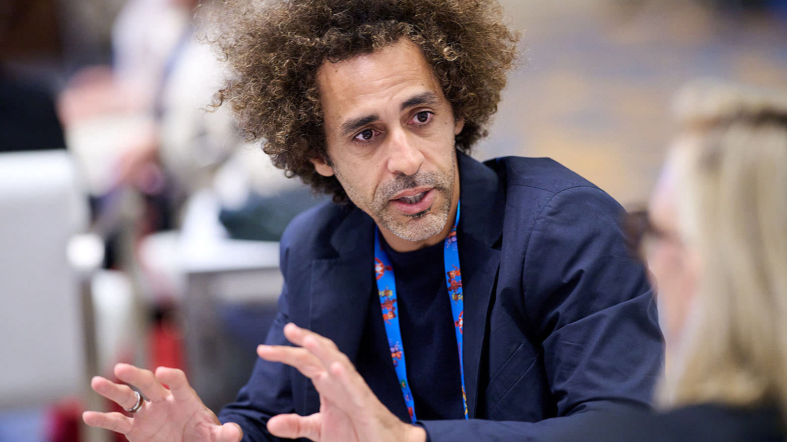 Engaged discussion between business partners.