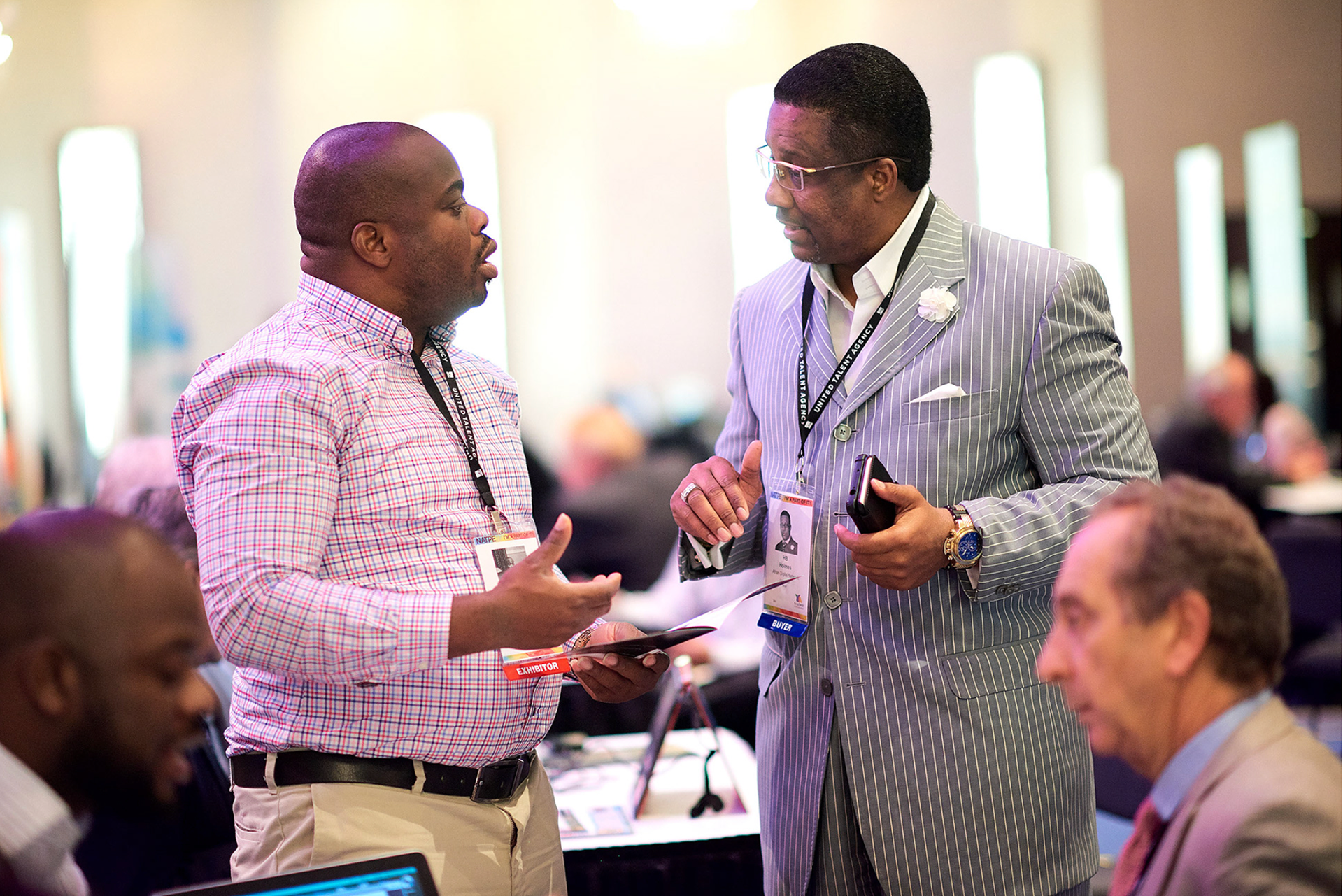 Meeting new clients during the summit.