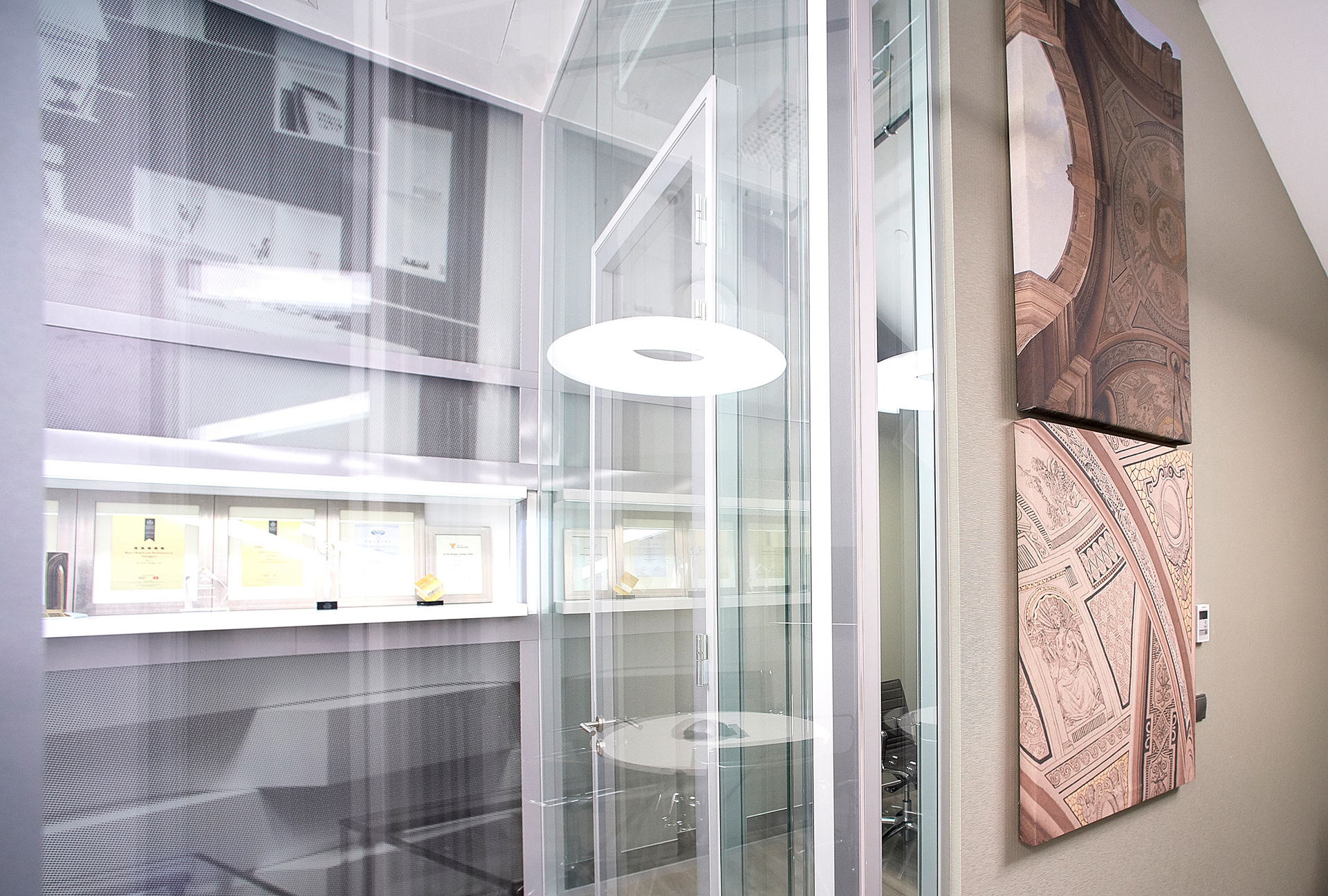 Creative reflections and building photographs on the wall