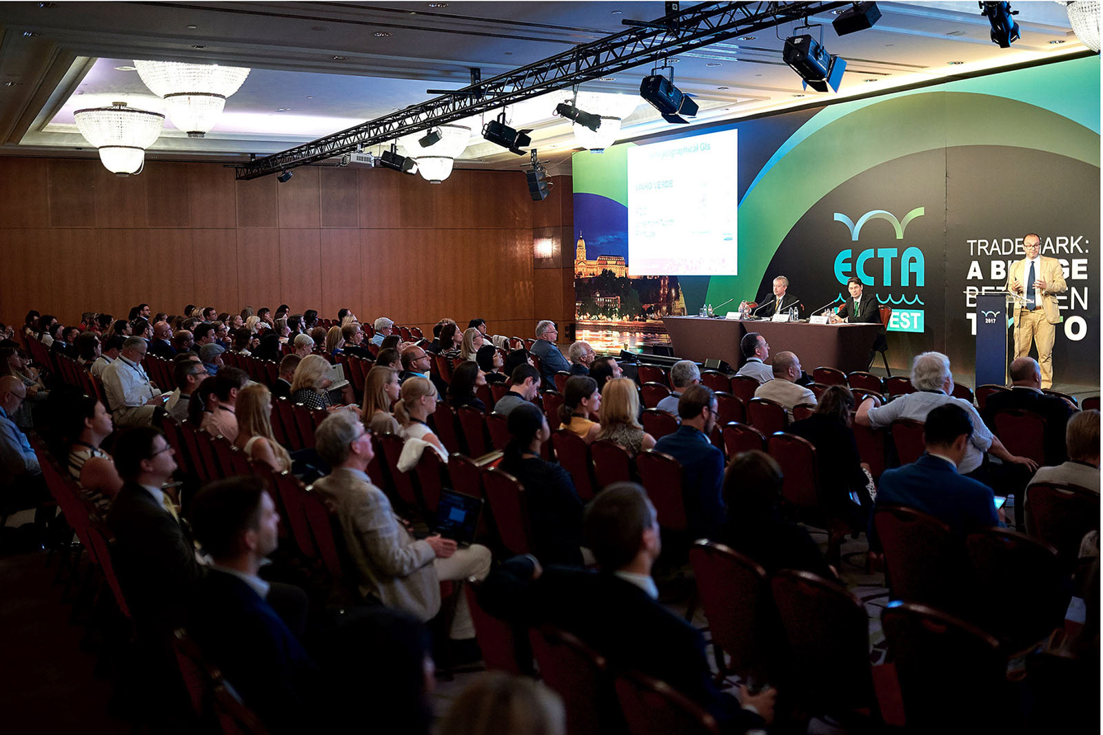 Conference participants listening to a speech.