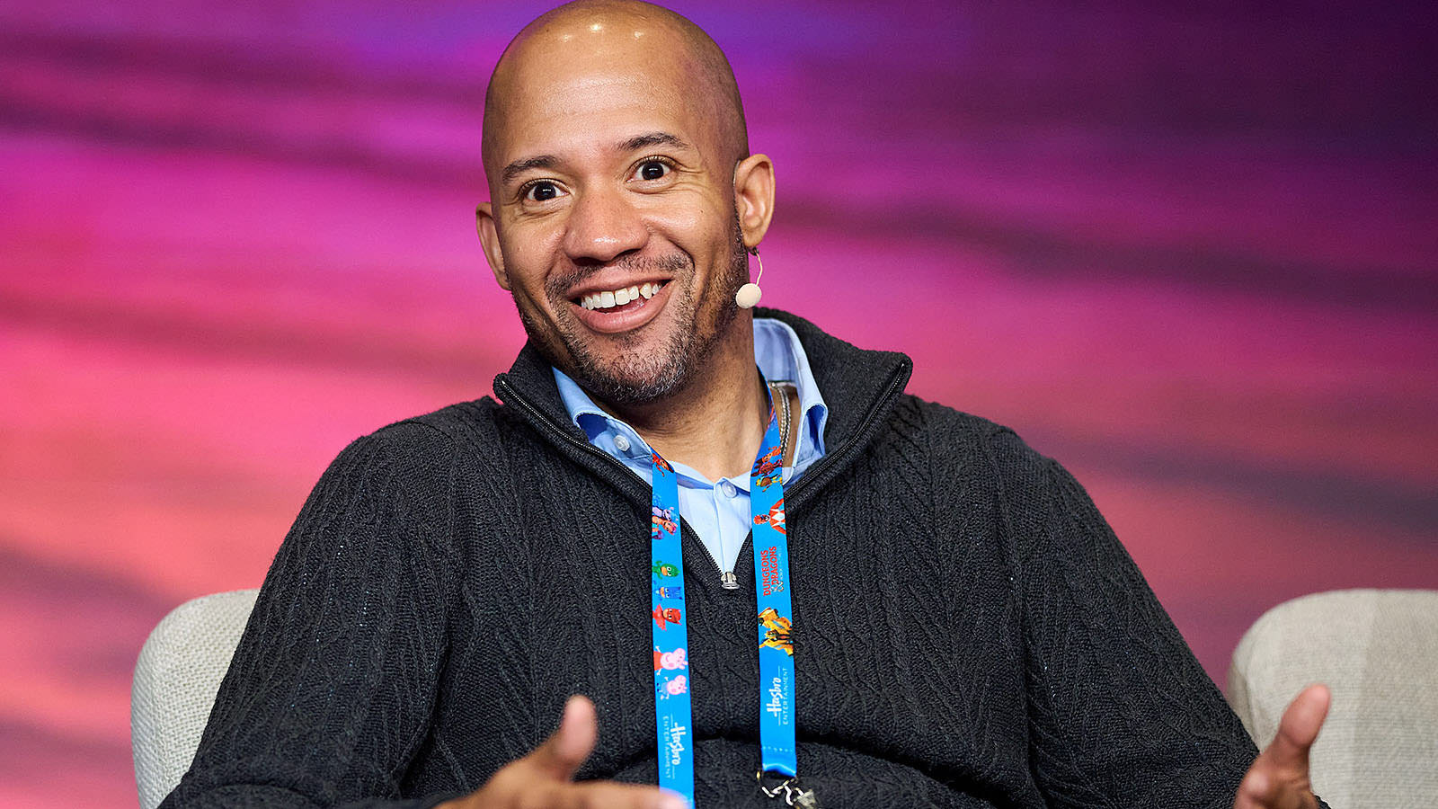 Engaged speaker contributing to a panel discussion.