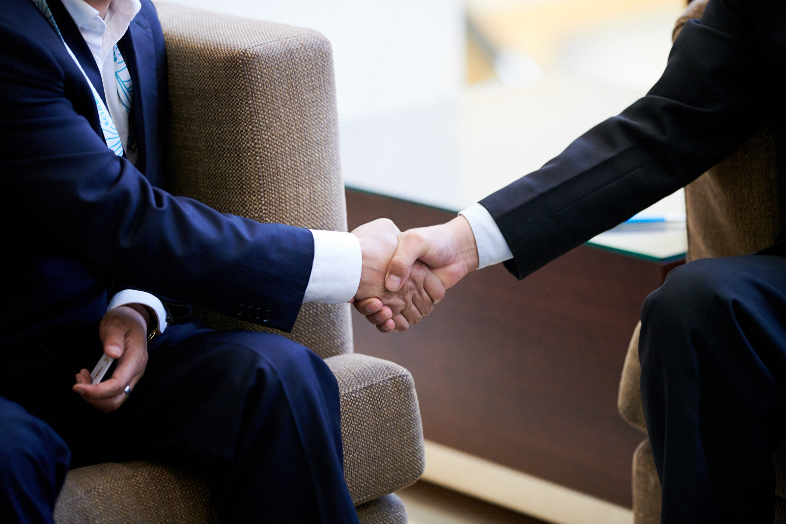 Handshake at the conference in Athens