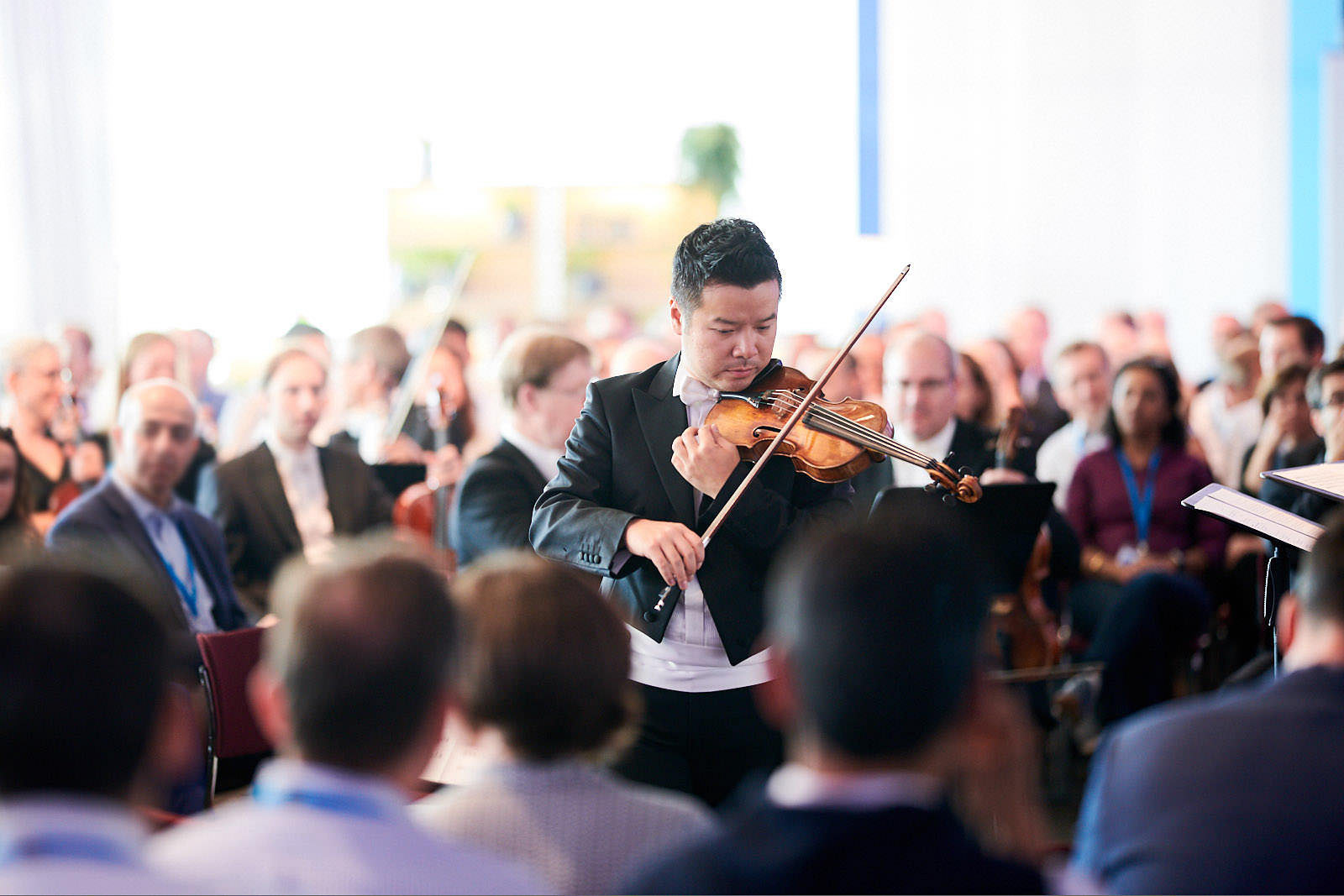 A world-class violinist performing at Bürgenstock Resort Lake Lucerne.