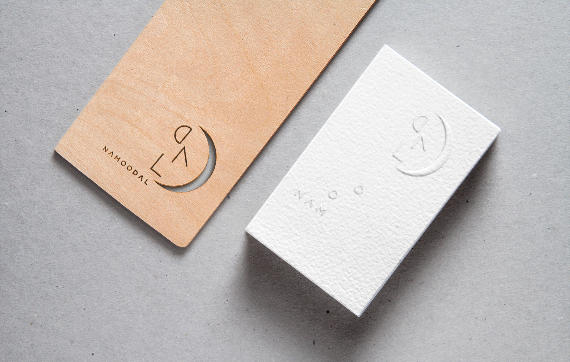  die cutting  on the wood and embossing printing on the paper of the namoodal studio logo & symbol | 나무위에 도무송 및 다이커팅 후가공 처리를 한 로고와 코튼페이퍼에 형압처리 한 로고