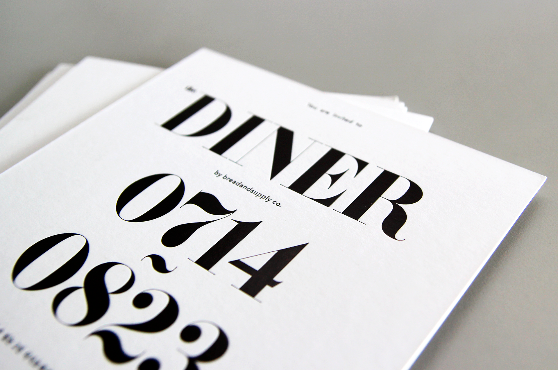 premium black foiled embossed invitation card of the B&S diner | Bread and Supply co 다이너 브랜드 런칭을 위한 고급 먹박 인쇄 초대장