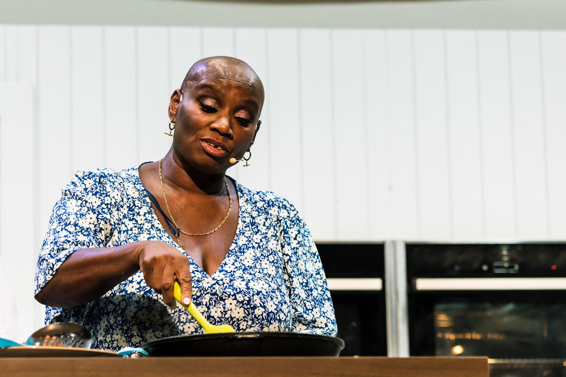 Andi Oliver cooks white sweet potato & saltfish fritters, ackee cream & green seasoning oil live in the Big Kitchen at the BBC Good Food Show Summer, hosted by Marcus Bean, 16th June 2022