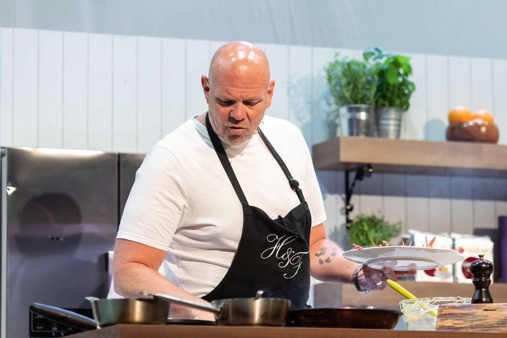 Tom Kerridge cooks T-bone steak with black pepper butter live in the Big Kitchen at BBC Good Food Show Summer, hosted by Marcus Bean, 16th June 2022