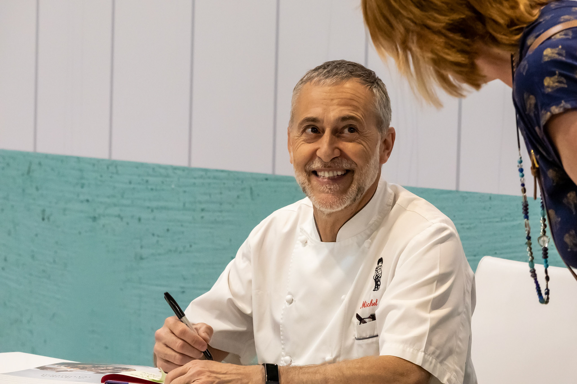 Michel Roux Junior signs his latest book, The French Revolution, for fans at the BBC Good Food Show Summer, June 2022