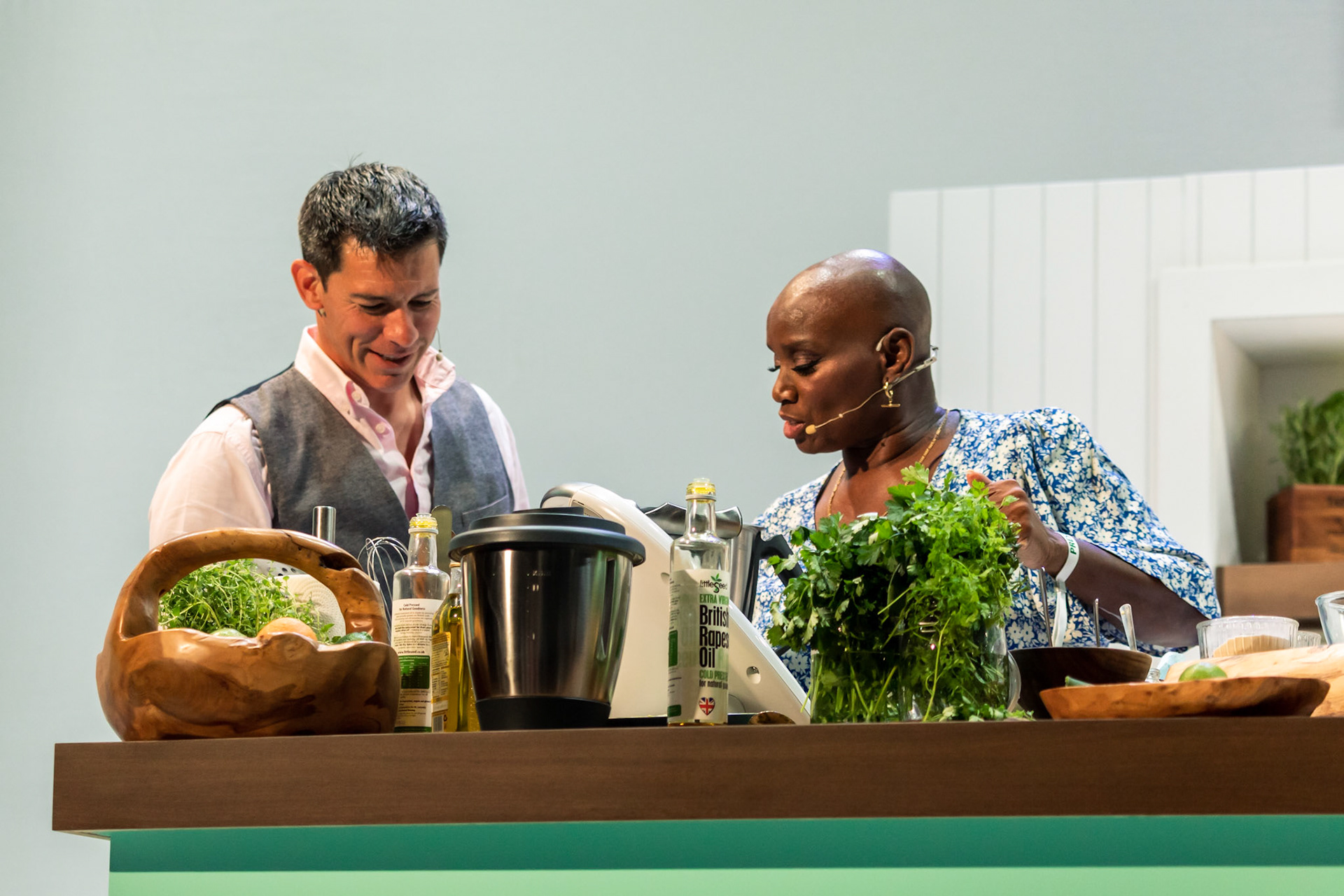 Andi Oliver cooks white sweet potato & saltfish fritters, ackee cream & green seasoning oil live in the Big Kitchen at the BBC Good Food Show Summer, hosted by Marcus Bean, 16th June 2022