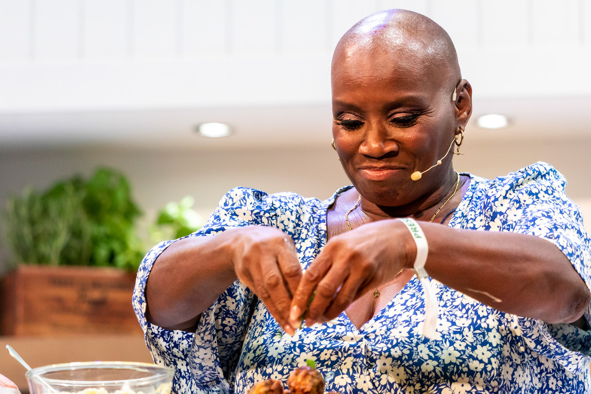 Andi Oliver cooks white sweet potato & saltfish fritters, ackee cream & green seasoning oil live in the Big Kitchen at the BBC Good Food Show Summer, hosted by Marcus Bean, 16th June 2022