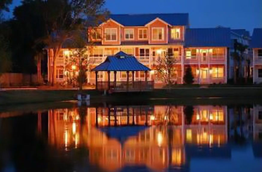 The housing structure overlooking the lakeside gazebo