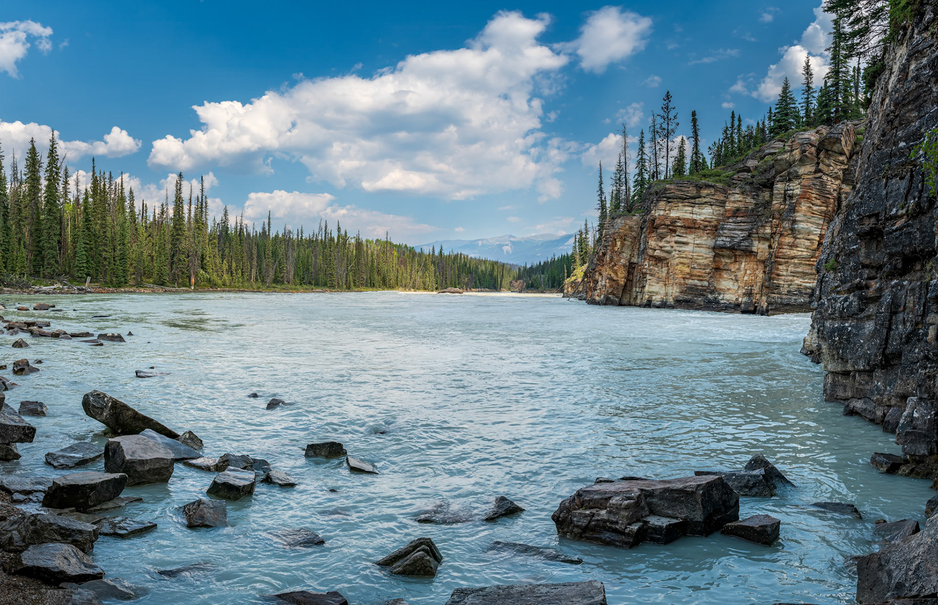 Time's Creation - View of the Athabasca River as it continues on just below the Athabasca Falls.