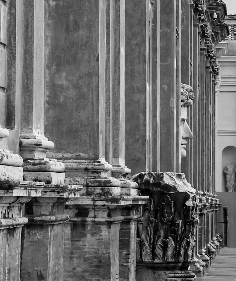 Peeking - Giant Head of Emperor  Augustus located at the Vatican Museum, appears to peeking through the columns