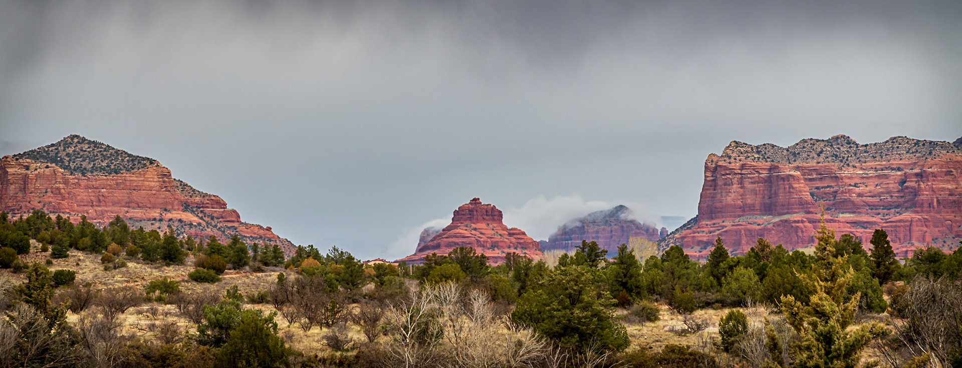 Moody Day Over Red Rocks of Sedona - Landscape the Bell Rock and the Courthouse Butte in Sedona AZ