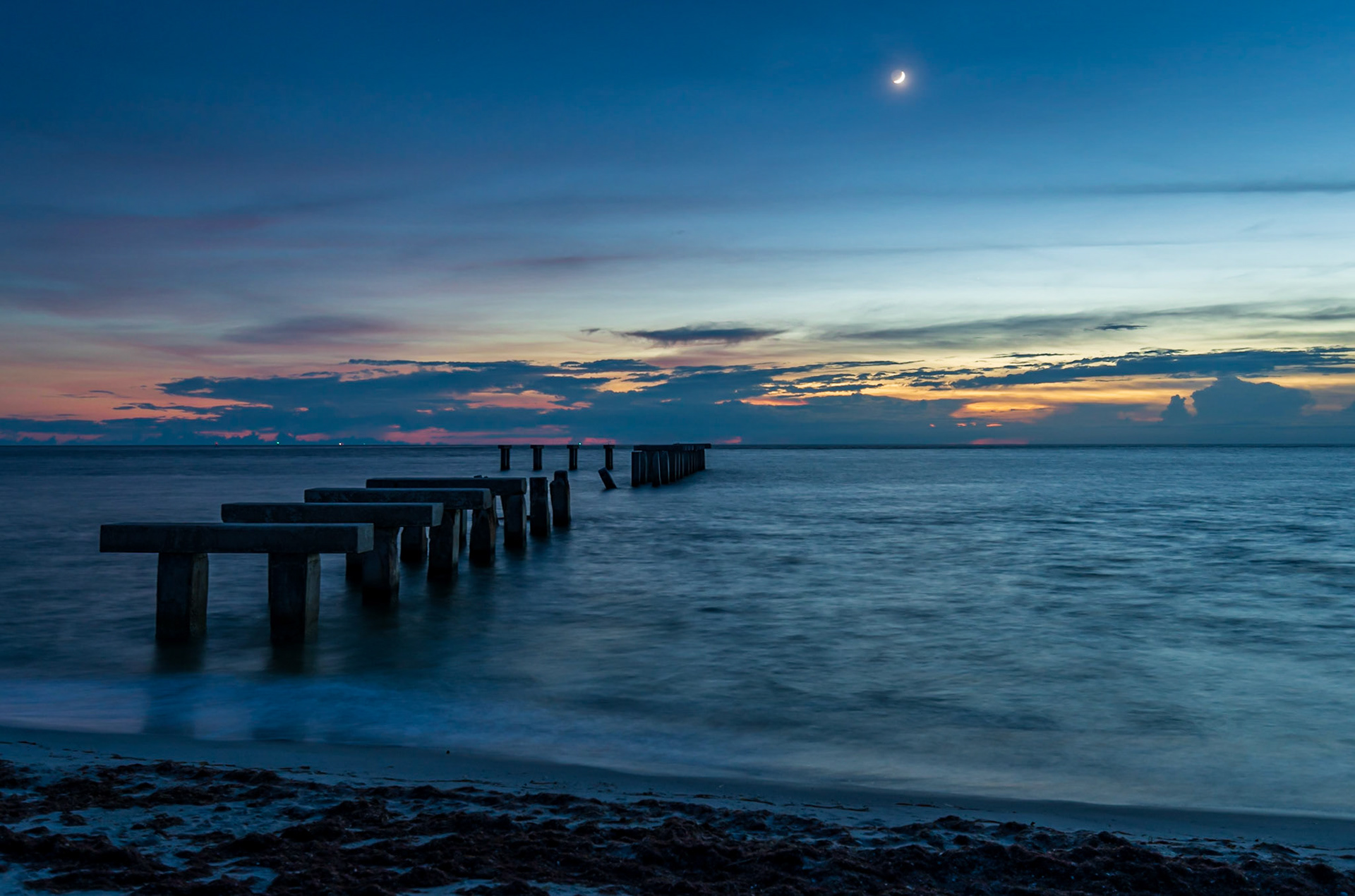 Moonset Chasing The Sunset Over the Gulf - From Gasparilla Island State Park, Florida