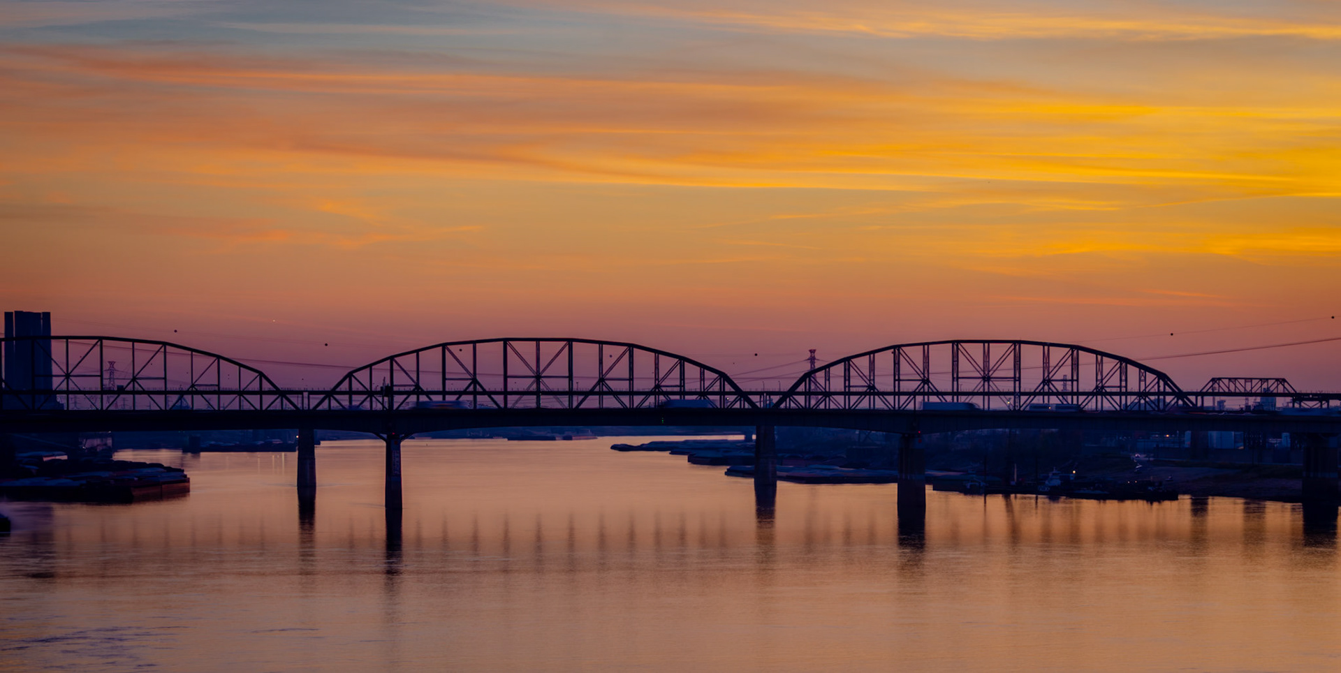 Mississippi River Sunset - View from the Eads Bridge overlooking the Popular Street and MacArthur Bridges along the St Louis riverfront