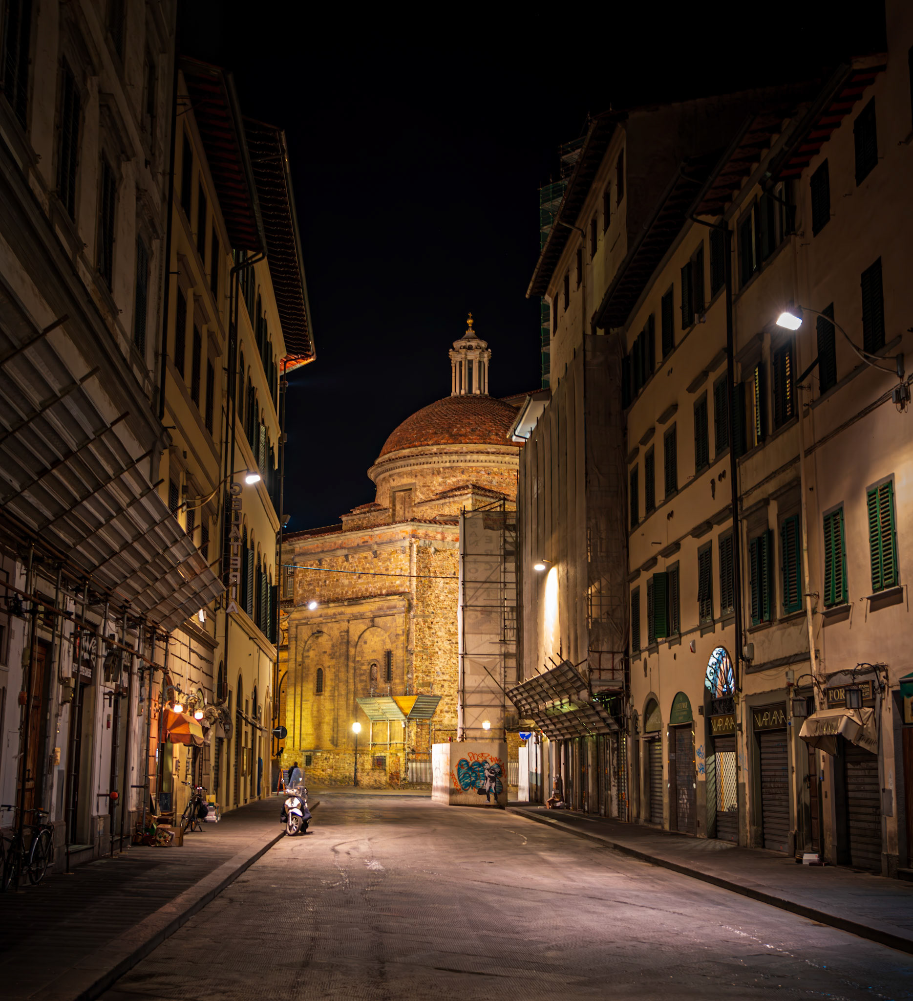 Renaissance - magnificent cityscape down a side street in Florence, Italy, reveals the Sagrestia Nuova, aka Medici Chapel, a mausoleum designed by Michelangelo and built from 1520 to 1534.