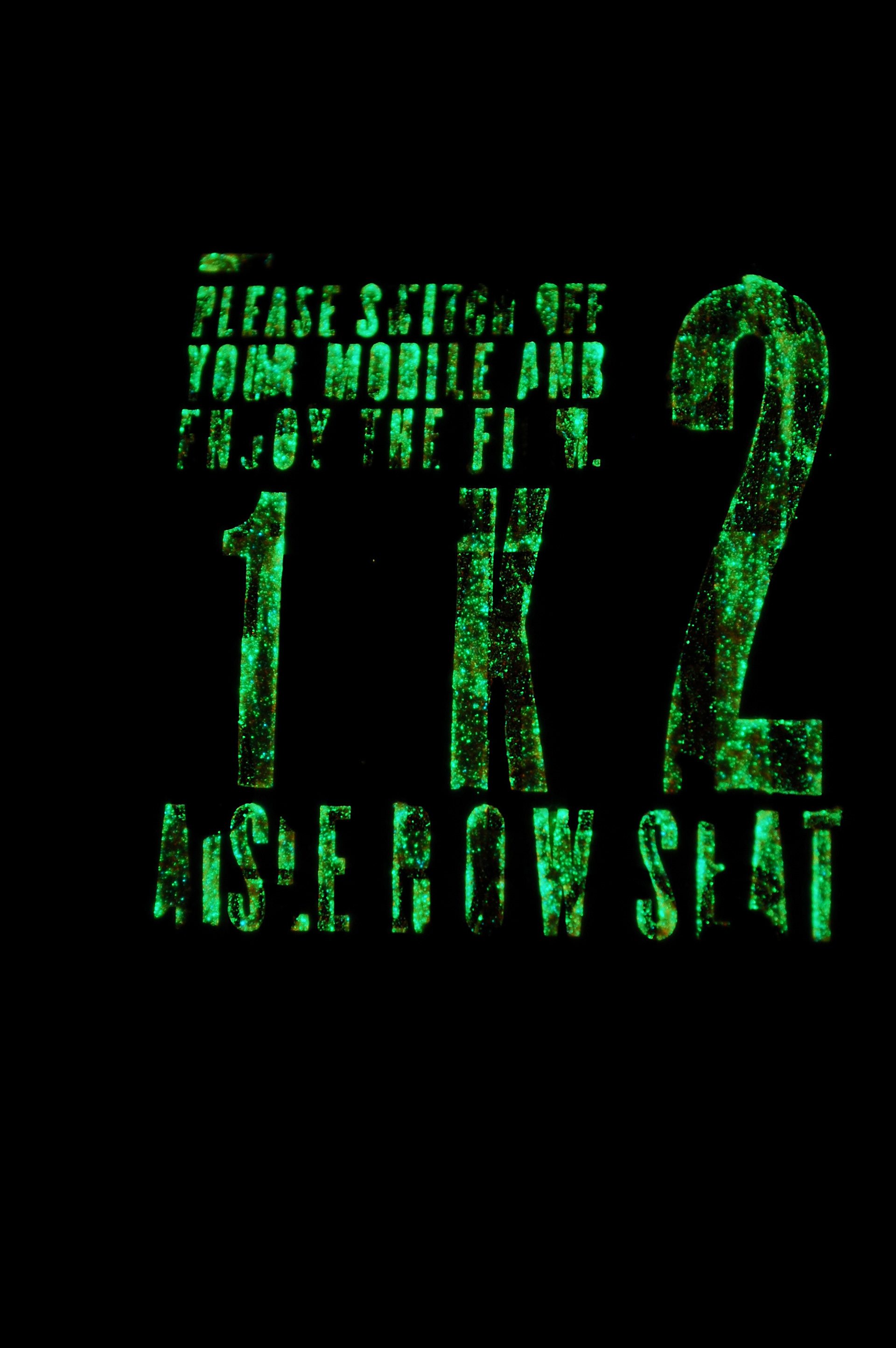 Cinema ticket in the dark - shows up information you need to know once in the screen using a glow in the dark ink.