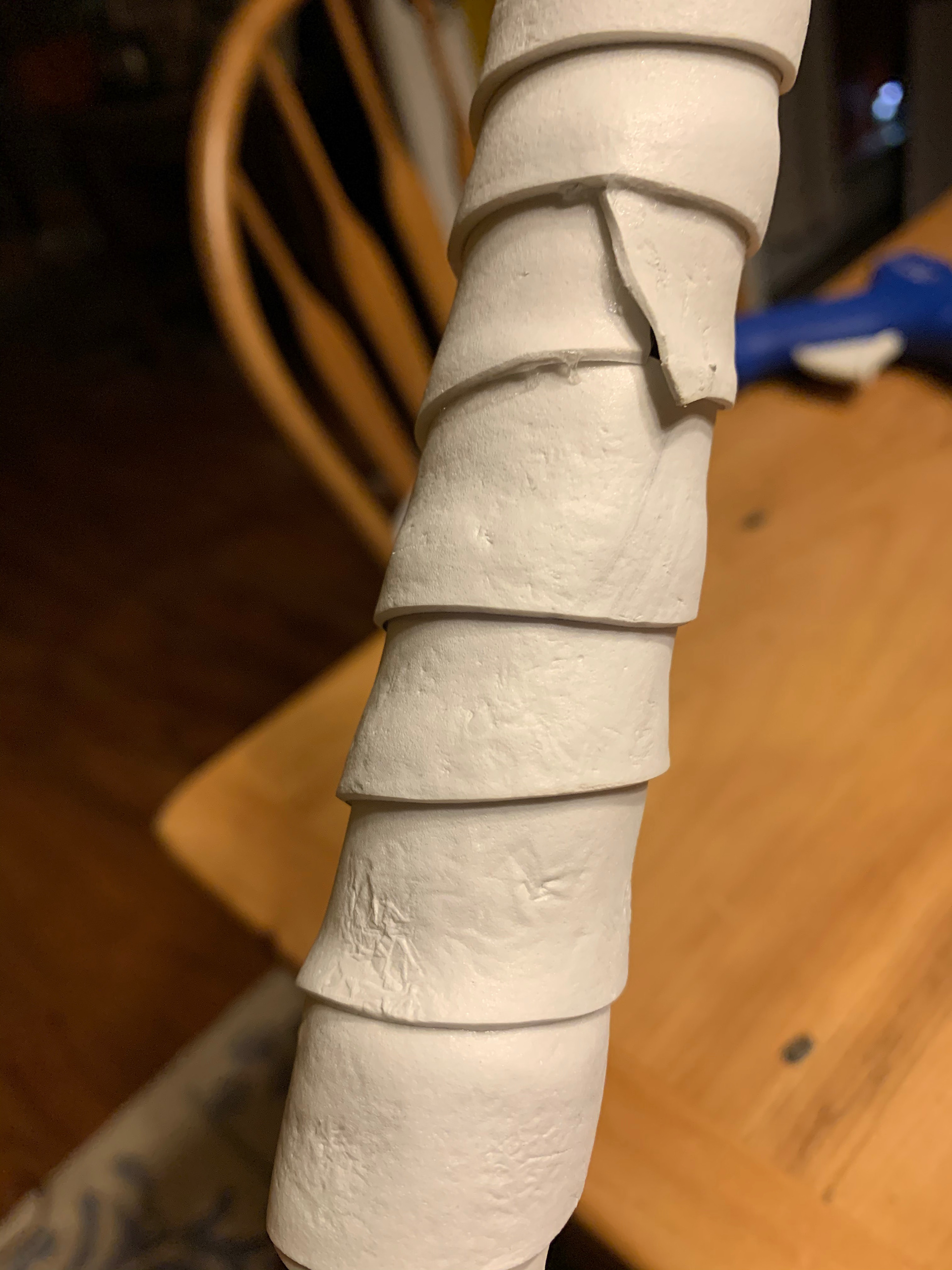 Adding a fake leather wrapped handle using 1mm HD foam and texturing it.