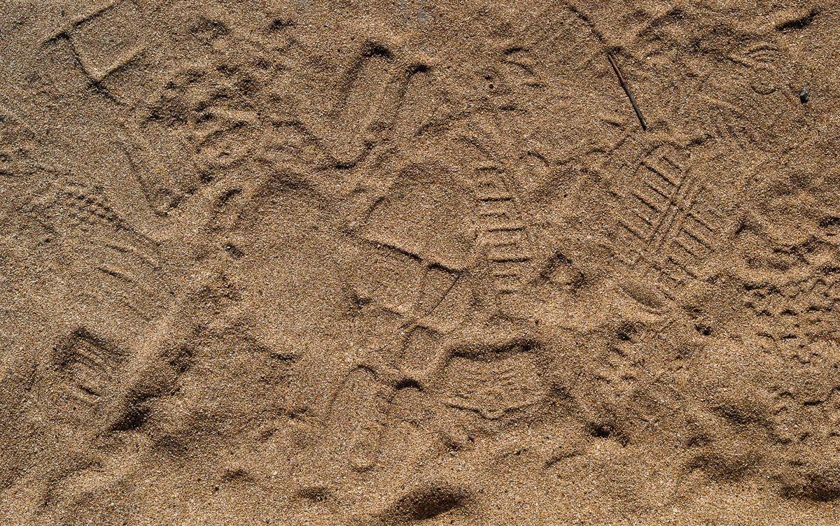 Footprints at Porthcurno beach