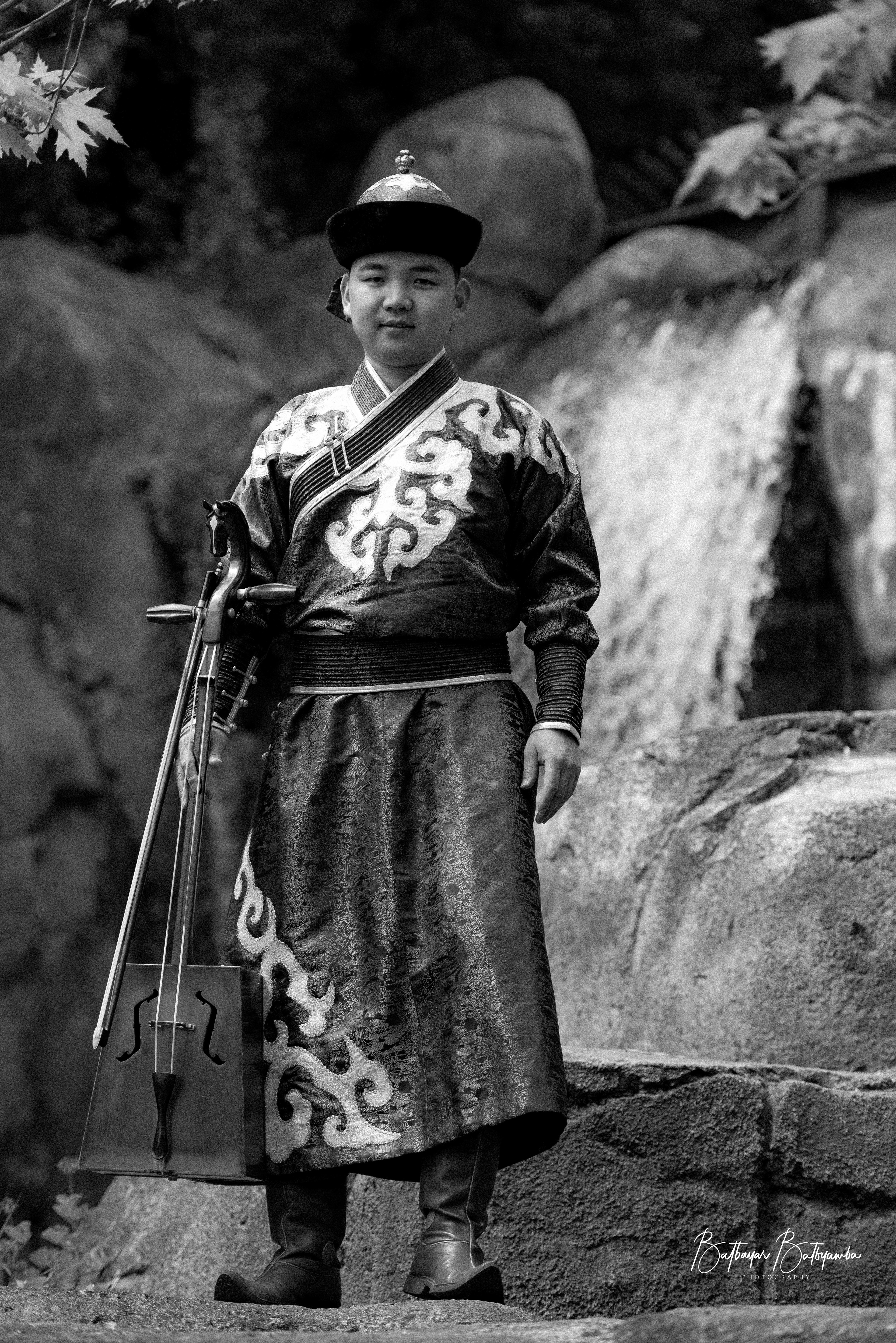 The morin khuur (horsehead fiddle)is a traditional Mongolian two-stringed instrument and a national symbol. Made with horsehair strings and a carved horsehead scroll, it produces a rich, melodic sound that evokes the landscapes and nomadic culture of Mongolia. Deeply tied to Mongolian heritage, it is used in folk music, storytelling, and rituals, embodying the spirit of the steppe and the reverence for horses.