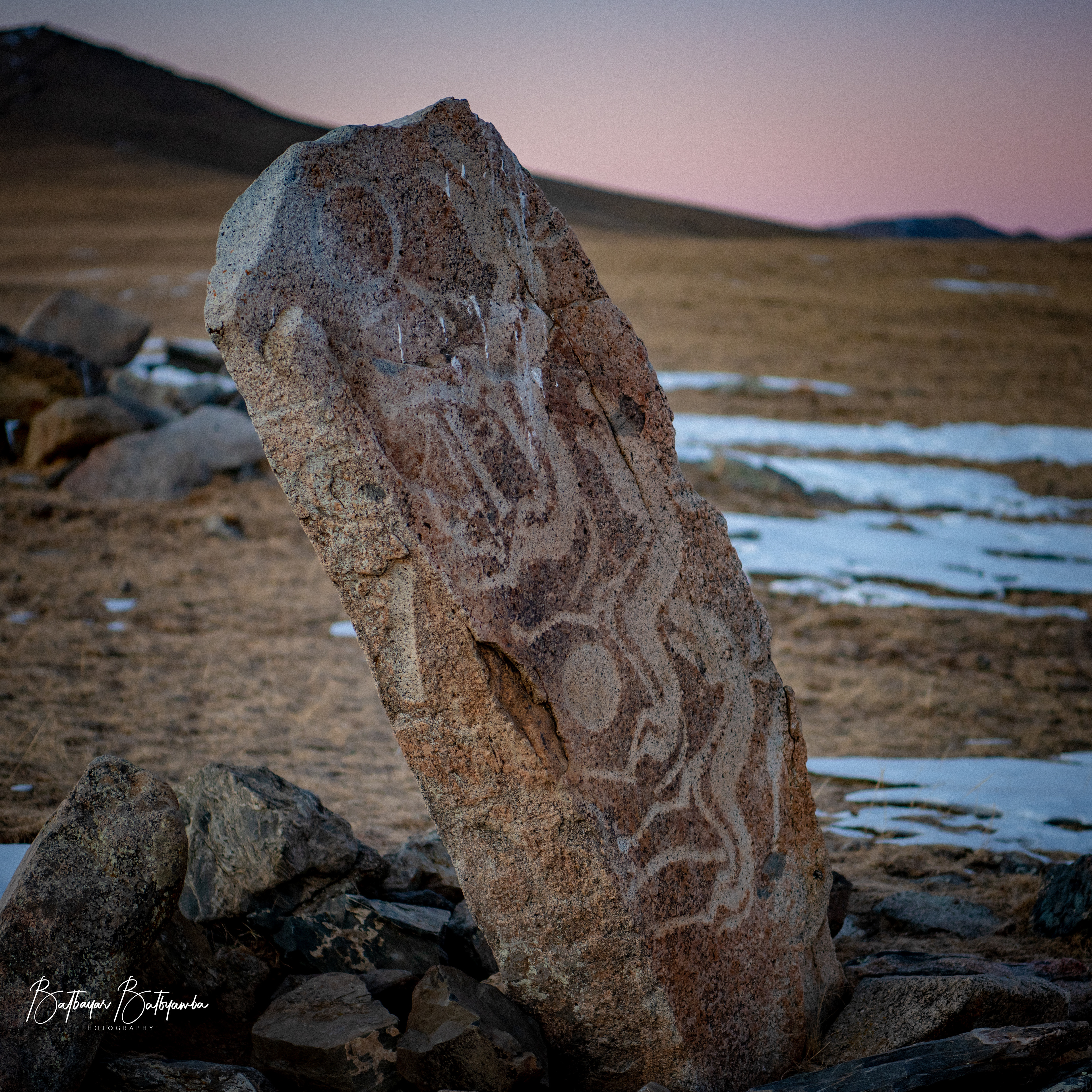 Ancient deer stone from the Hunnu era, a symbol of Mongolia’s early nomadic culture. 2018