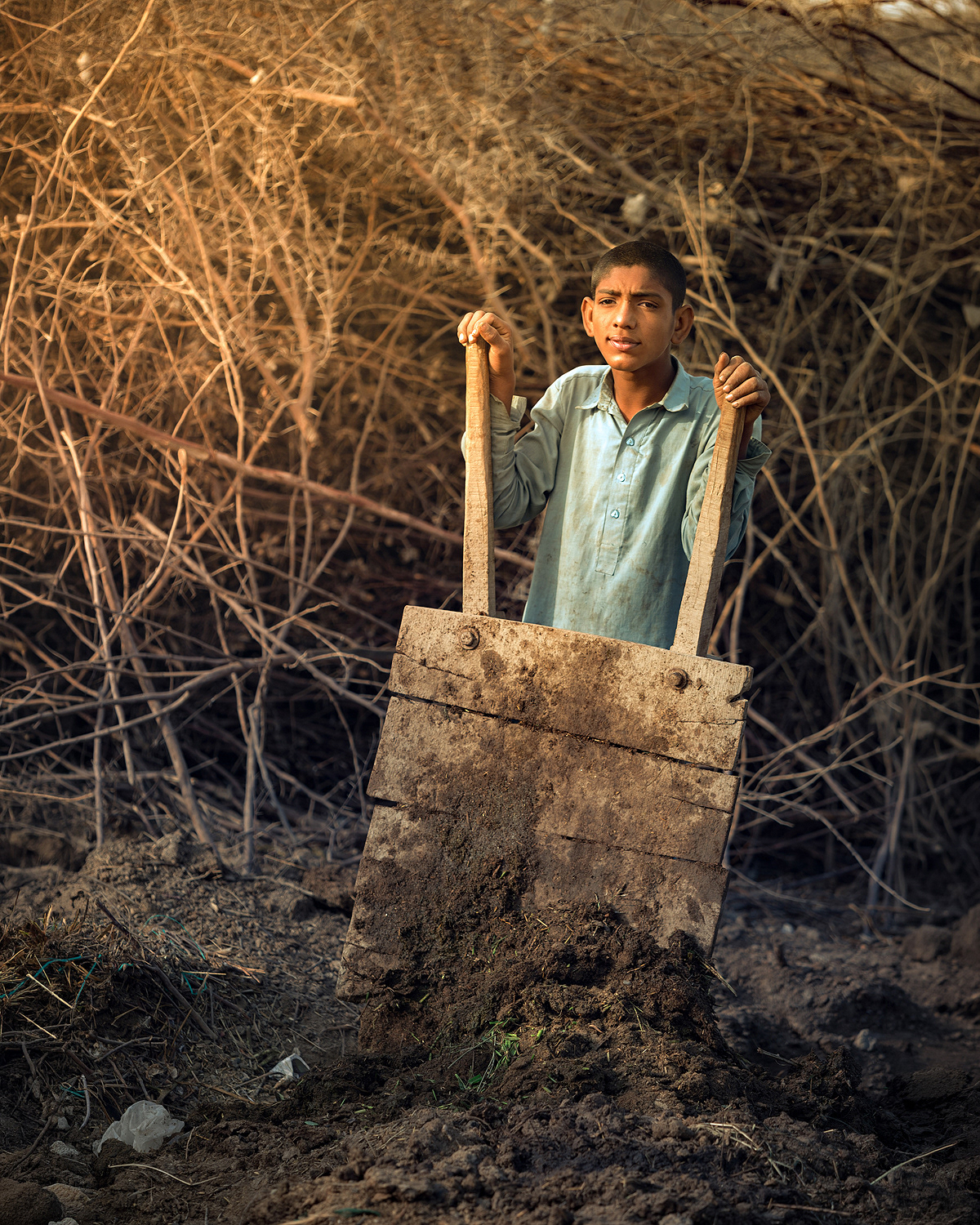 Farm Worker Boy in Rural Pakistan
