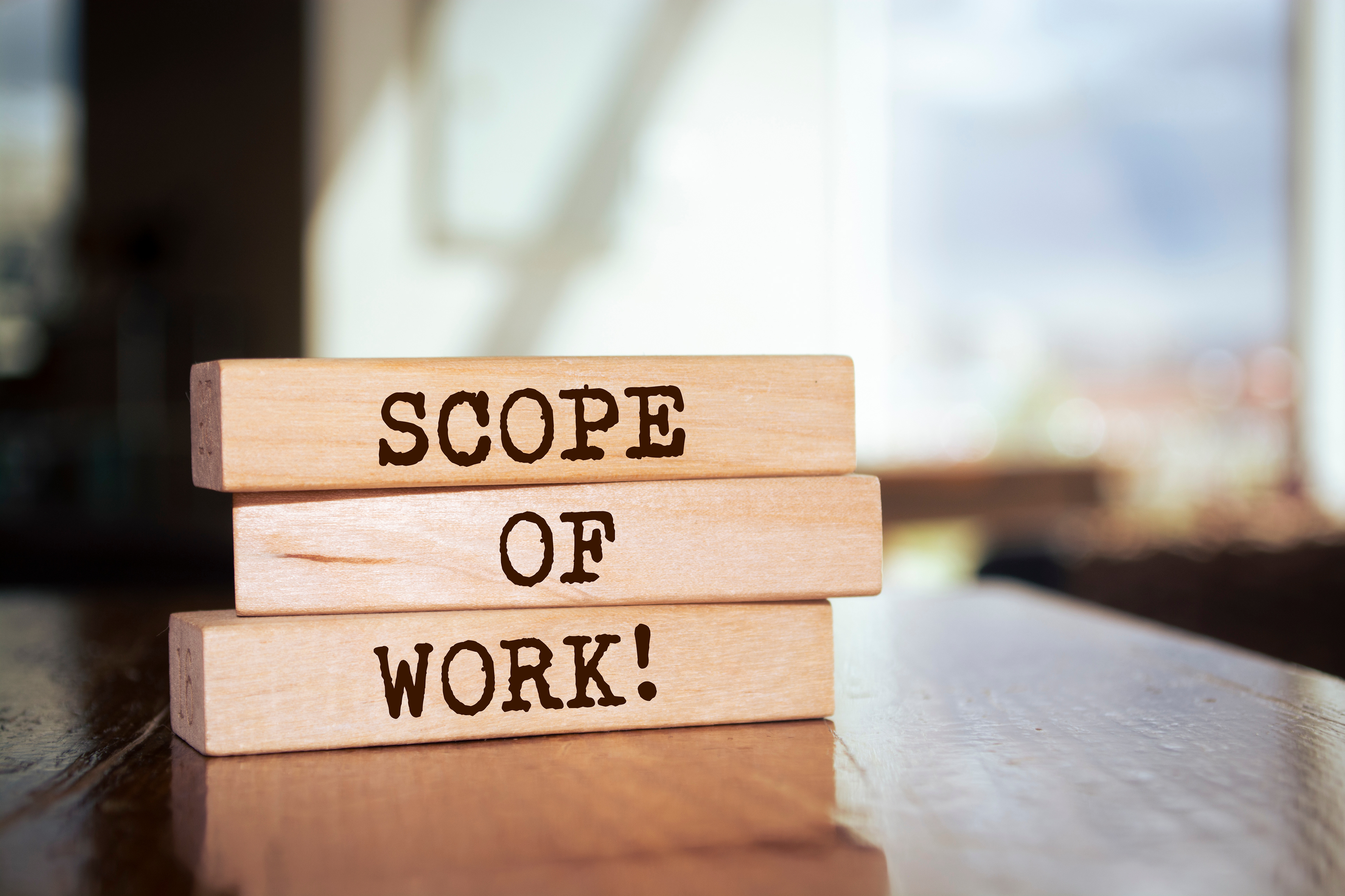 Blocks spelling out Scope of Work