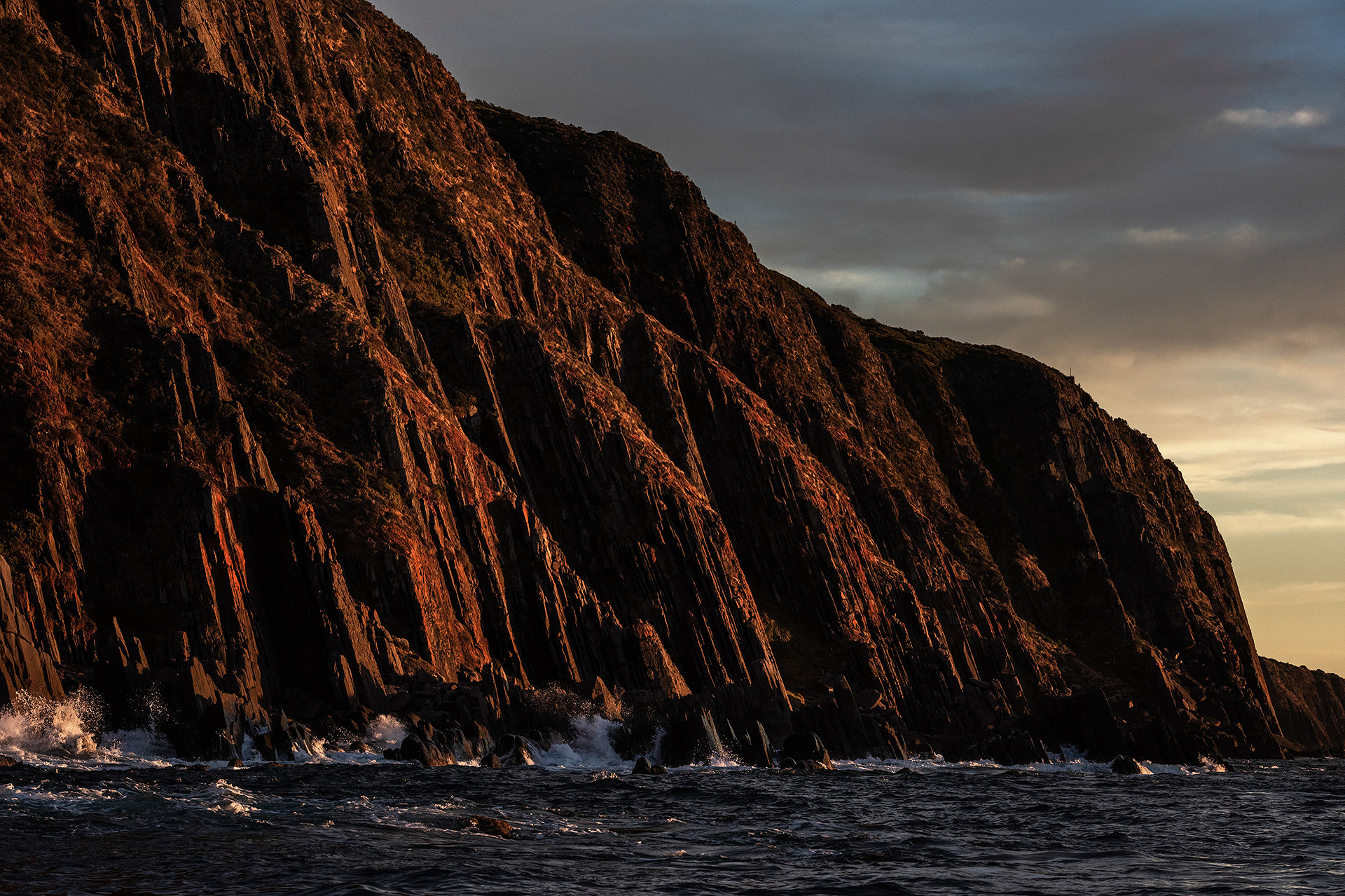 Cliffs of the Fleurieu coast plunge into the southern ocean at sunrise