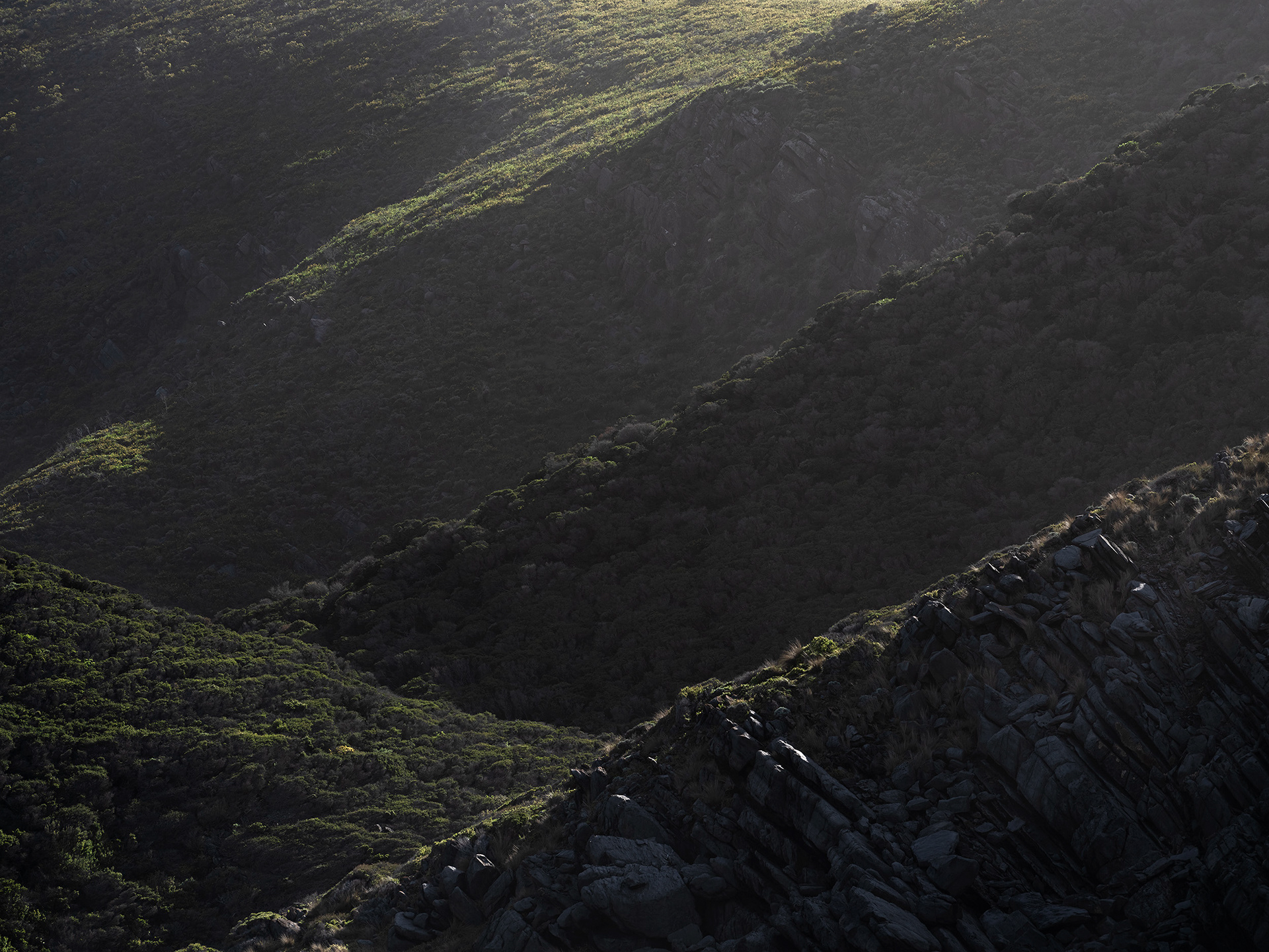 Sculpted hills from the deep river valleys of Deep Creek meet the waters of Backstairs passage