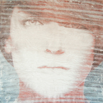 Gesso transferred found image on canvas.