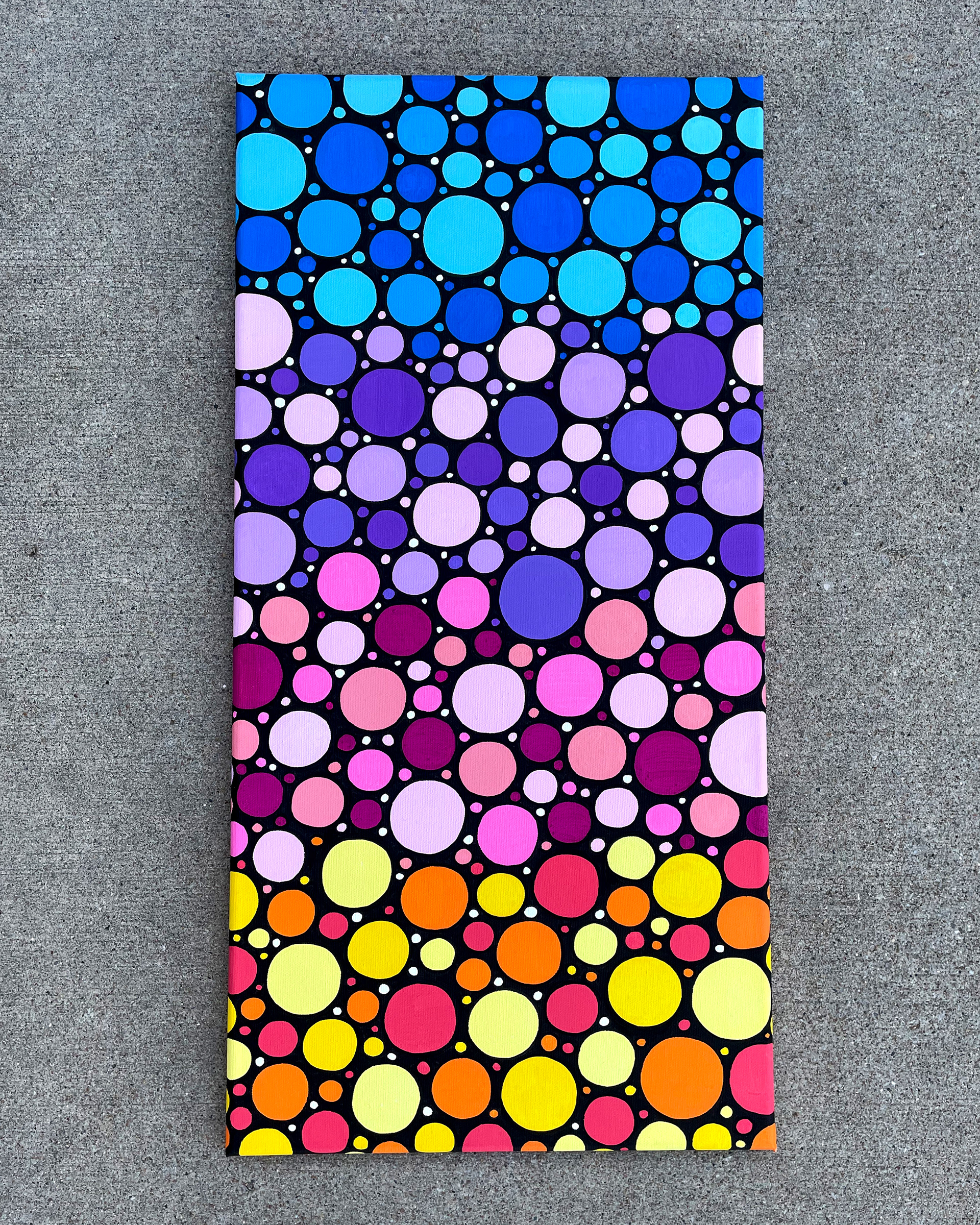 "Sunrise Circles no. 2," Acrylic on canvas. 12 x 24 x 0.5 inches. 2022.