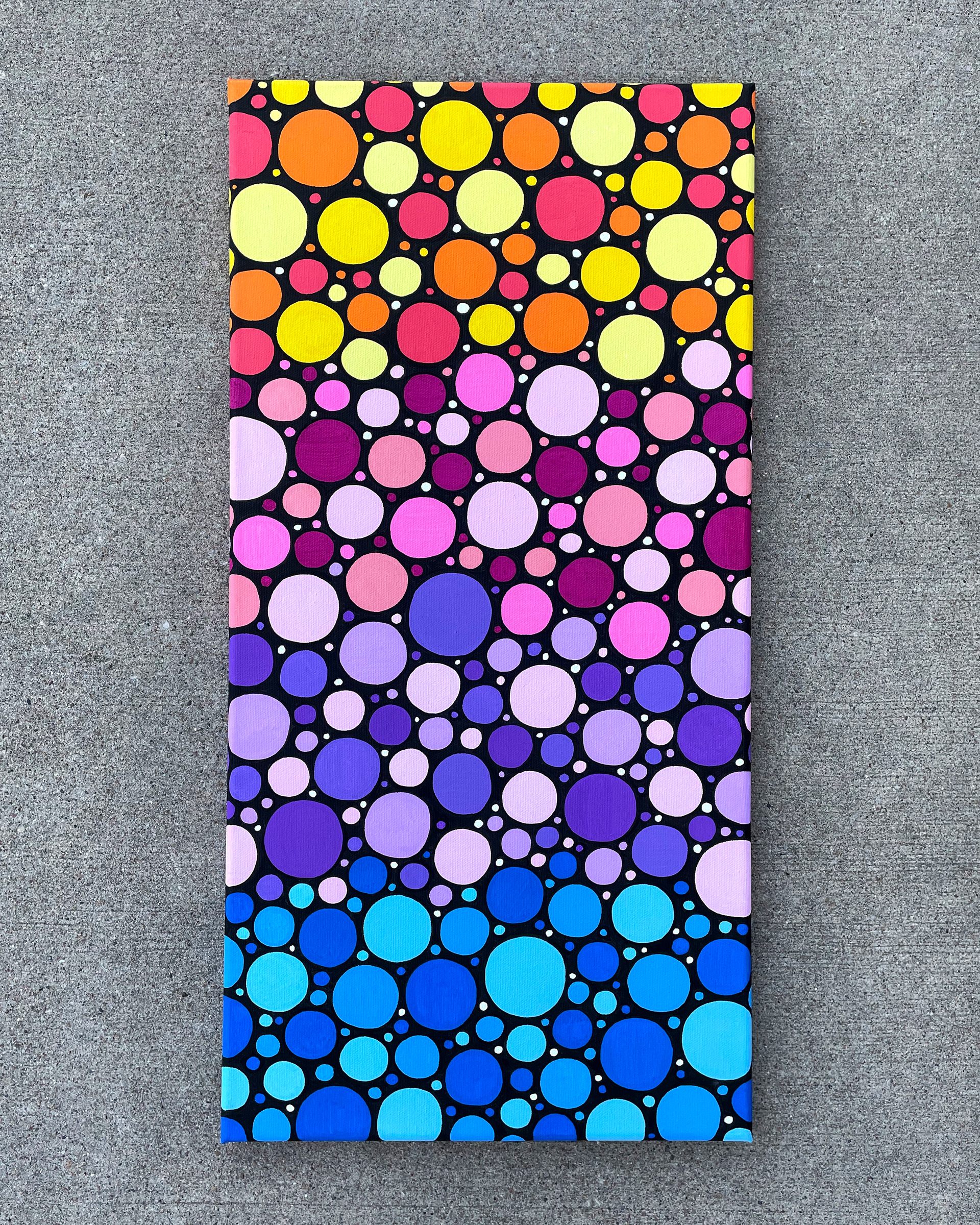 "Sunrise Circles no. 2," Acrylic on canvas. 12 x 24 x 0.5 inches. 2022.