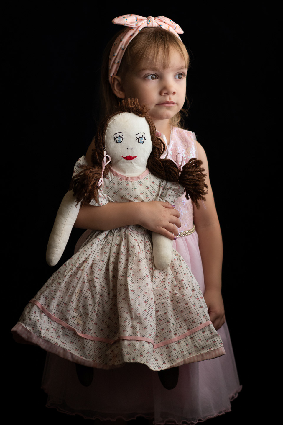 The doll she holds was made by my Grandma Charlotte (Ella Charlotte after her!) it is a transitional doll that is two dolls in one. Here is one side...