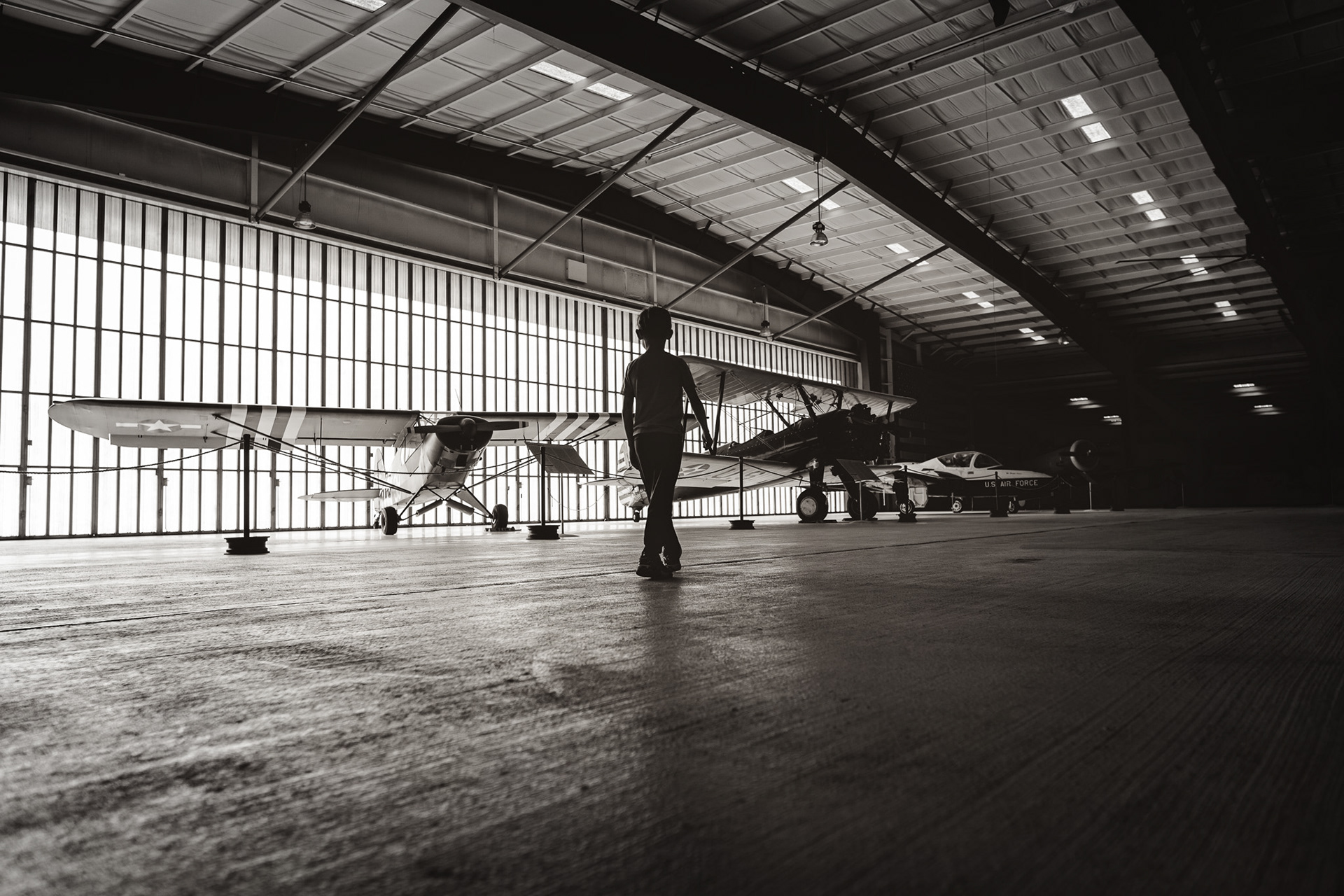 In the foreground, Piper PA-18 Super Cub